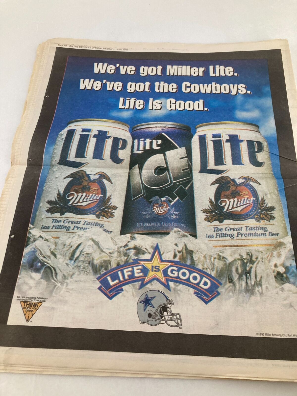 Advertisement in the Dallas Cowboys Weekly Newspaper June 1997 Vol 23 #5 promoting Miller Lite beer with the slogan 'Life is Good' alongside Dallas Cowboys branding.