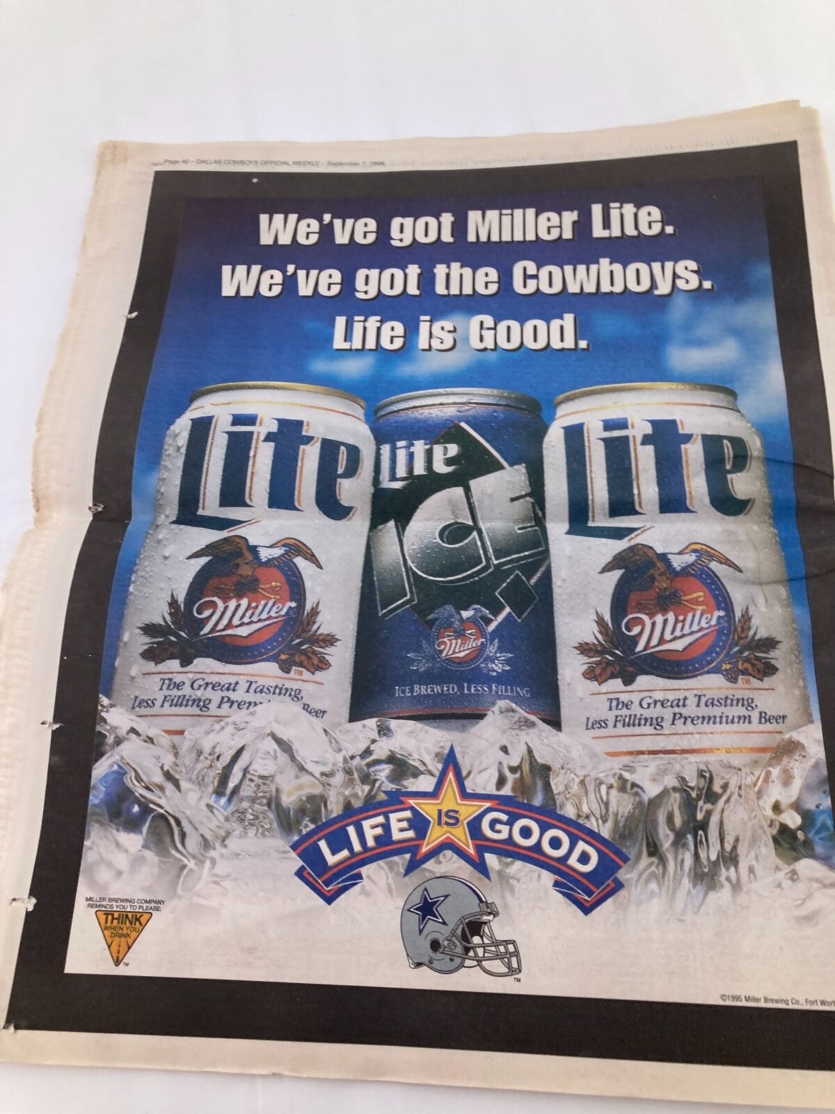 Dallas Cowboys Weekly Newspaper September 7 1996 Vol 22 #13 featuring an advertisement for Miller Lite beer. The newspaper highlights the connection between Miller Lite and the Dallas Cowboys, showcasing the tagline 'Life is Good'.