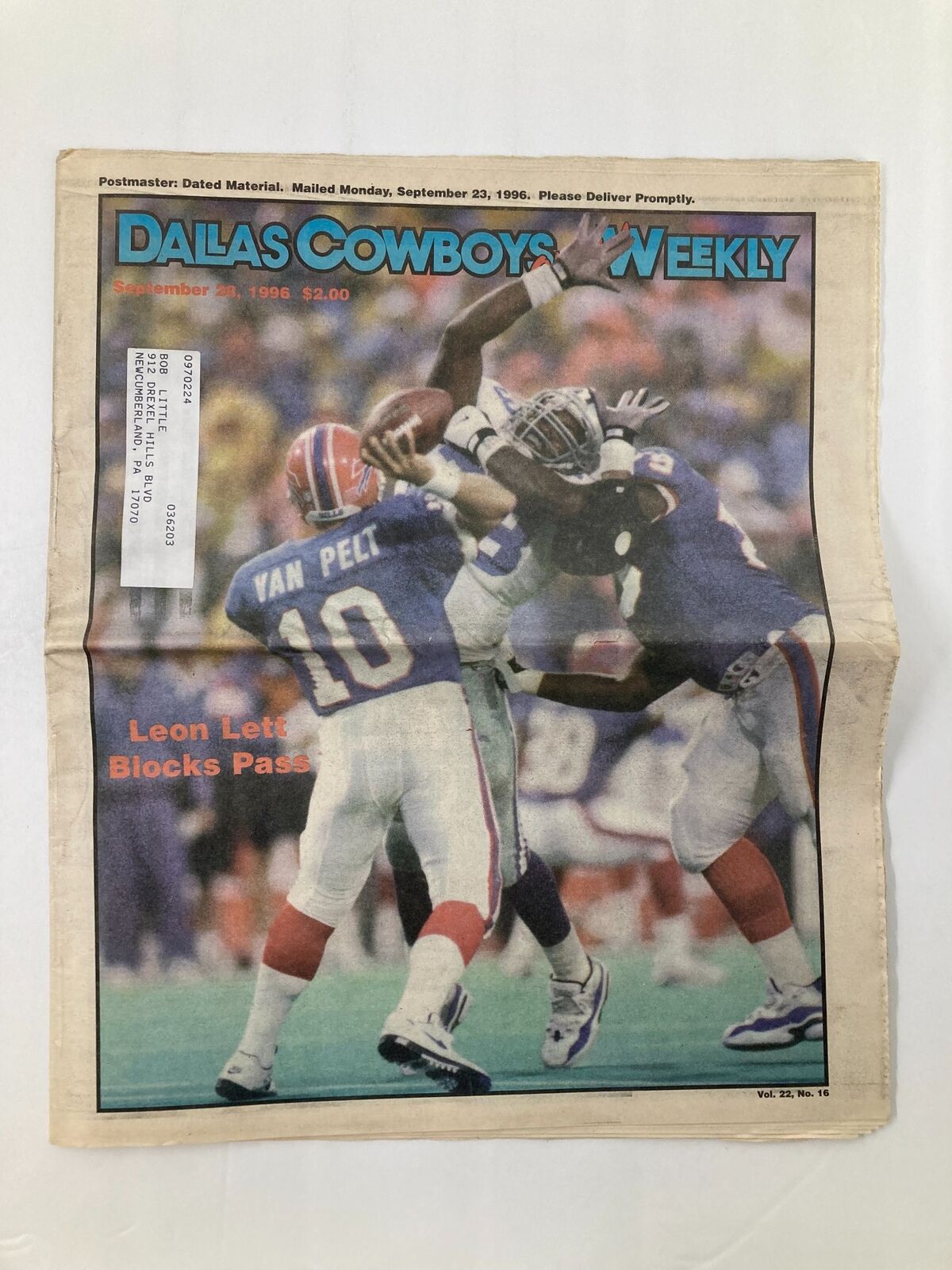 Dallas Cowboys Weekly Newspaper September 28 1996 Vol 22 #16 featuring Leon Lett blocking a pass during a game, highlighting the football action of the 1996 season.