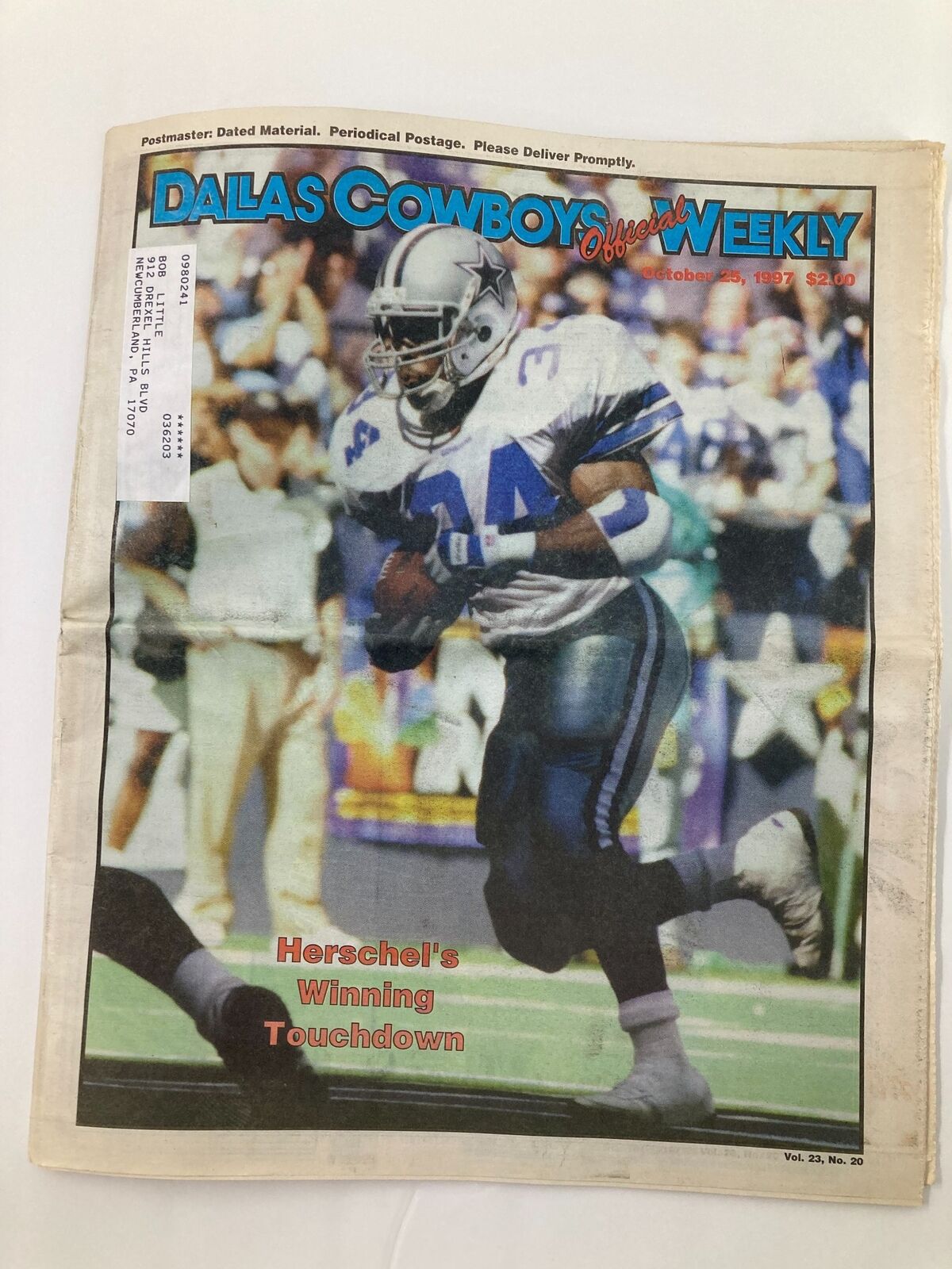 Dallas Cowboys Weekly Newspaper cover from October 25, 1997, featuring a photo of Herschel Walker running with the ball and the headline 'Herschel's Winning Touchdown', Vol 23 #20.