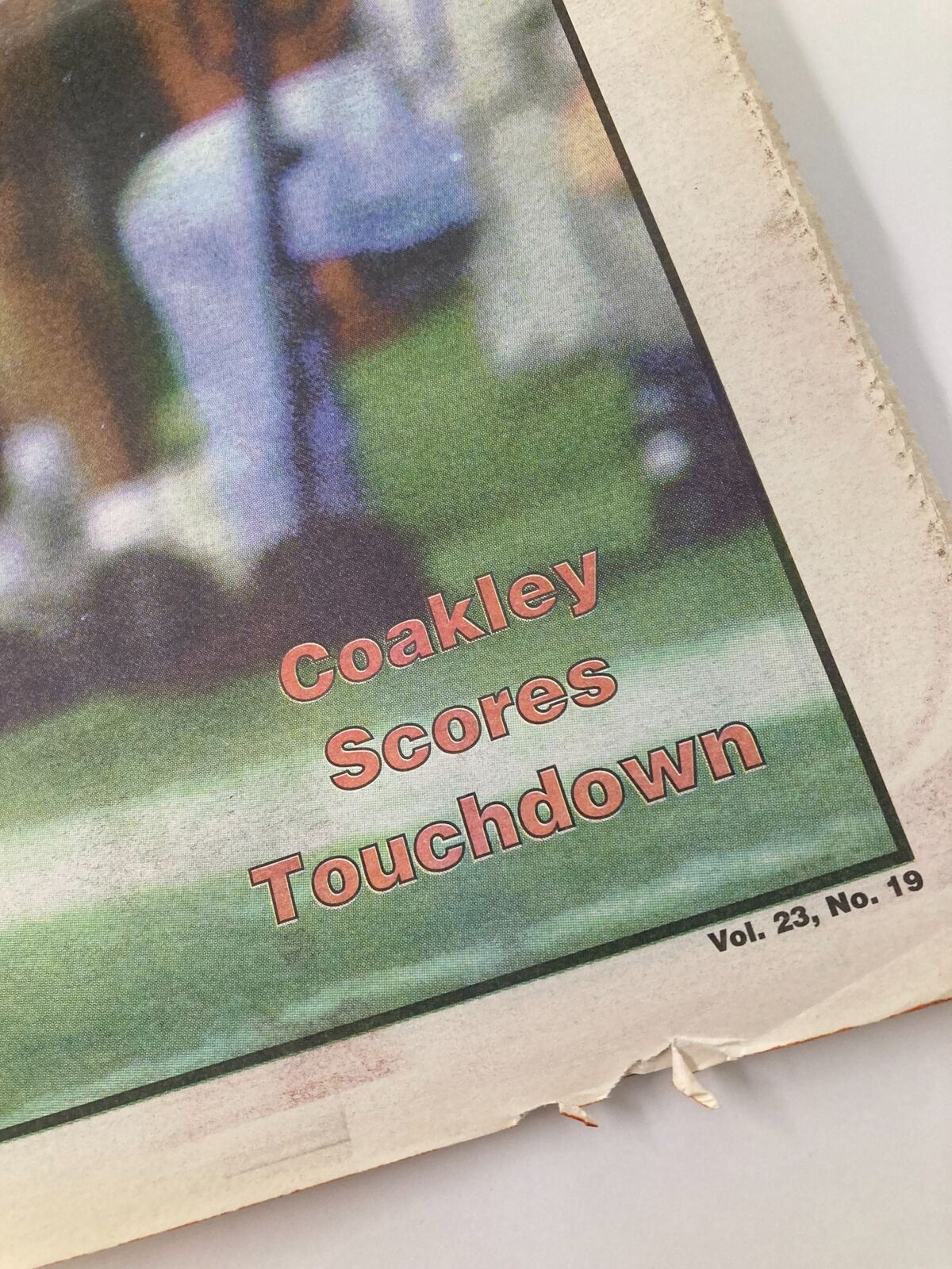 Close-up of the Dallas Cowboys Weekly Newspaper dated October 18, 1997, highlighting 'Coakley Scores Touchdown' in bold text. Volume 23, Number 19.