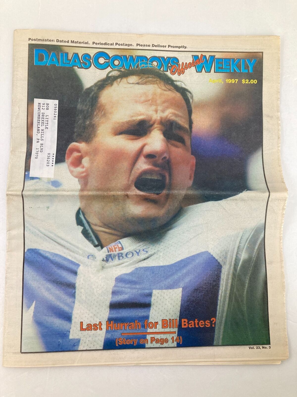 Dallas Cowboys Weekly Newspaper from April 1997, Vol 23 #3 featuring Bill Bates in emotional action during his last hurrah. This vintage sports publication showcases a powerful image reflecting the intensity of the game.
