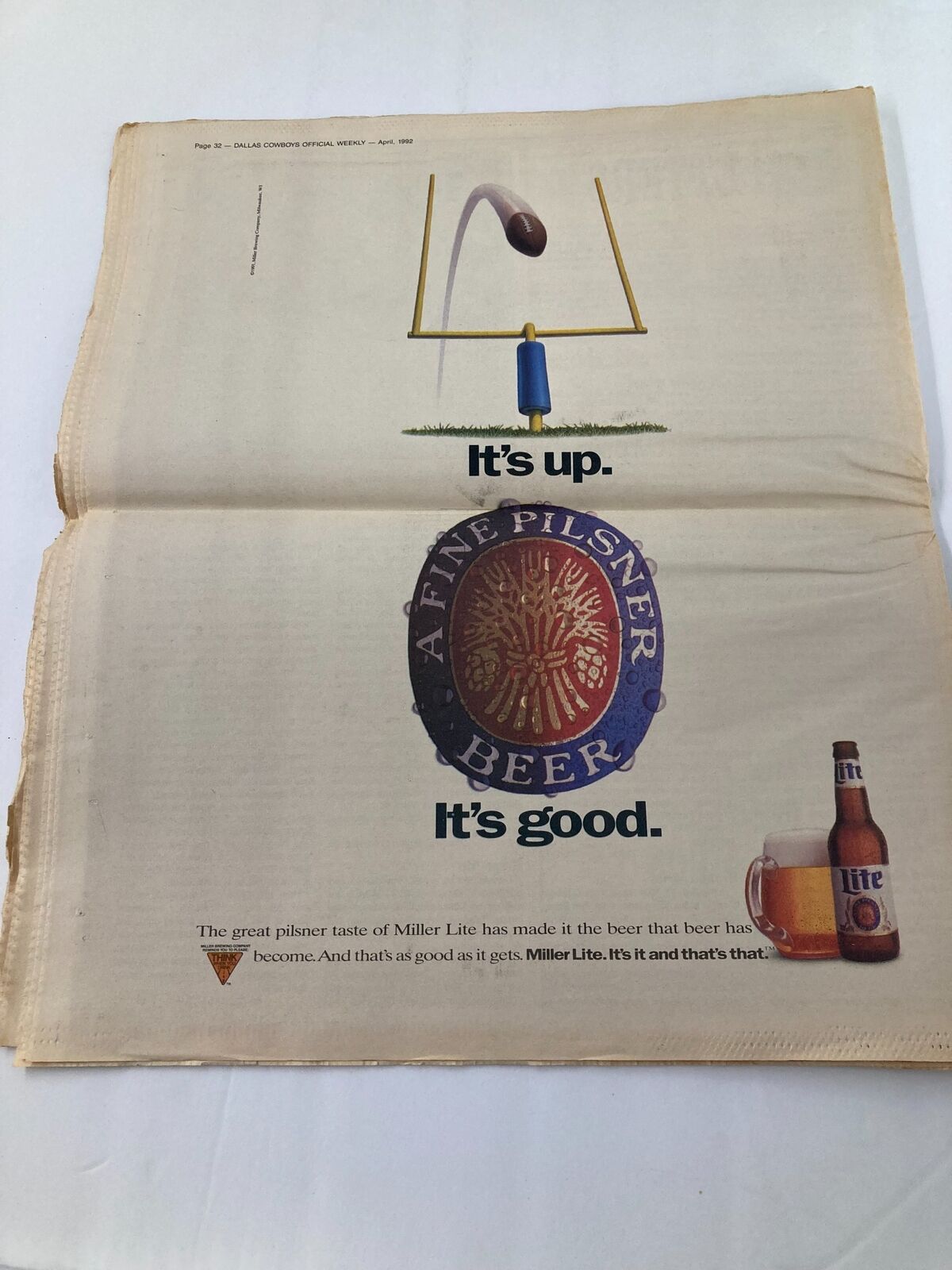 Advertisement from the Dallas Cowboys Weekly Newspaper April 1992 Vol 18 #3 showcasing a Miller Lite beer ad stating 'It's up. It's good.' with an illustration of a football goal post.