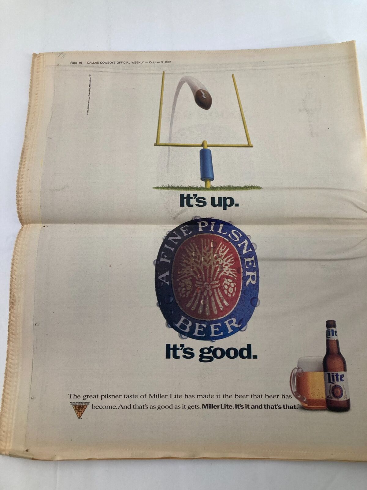 Advertisement page from the Dallas Cowboys Weekly Newspaper October 3 1992 Vol 18 #16 promoting Miller Lite beer with a graphic of a beer glass.