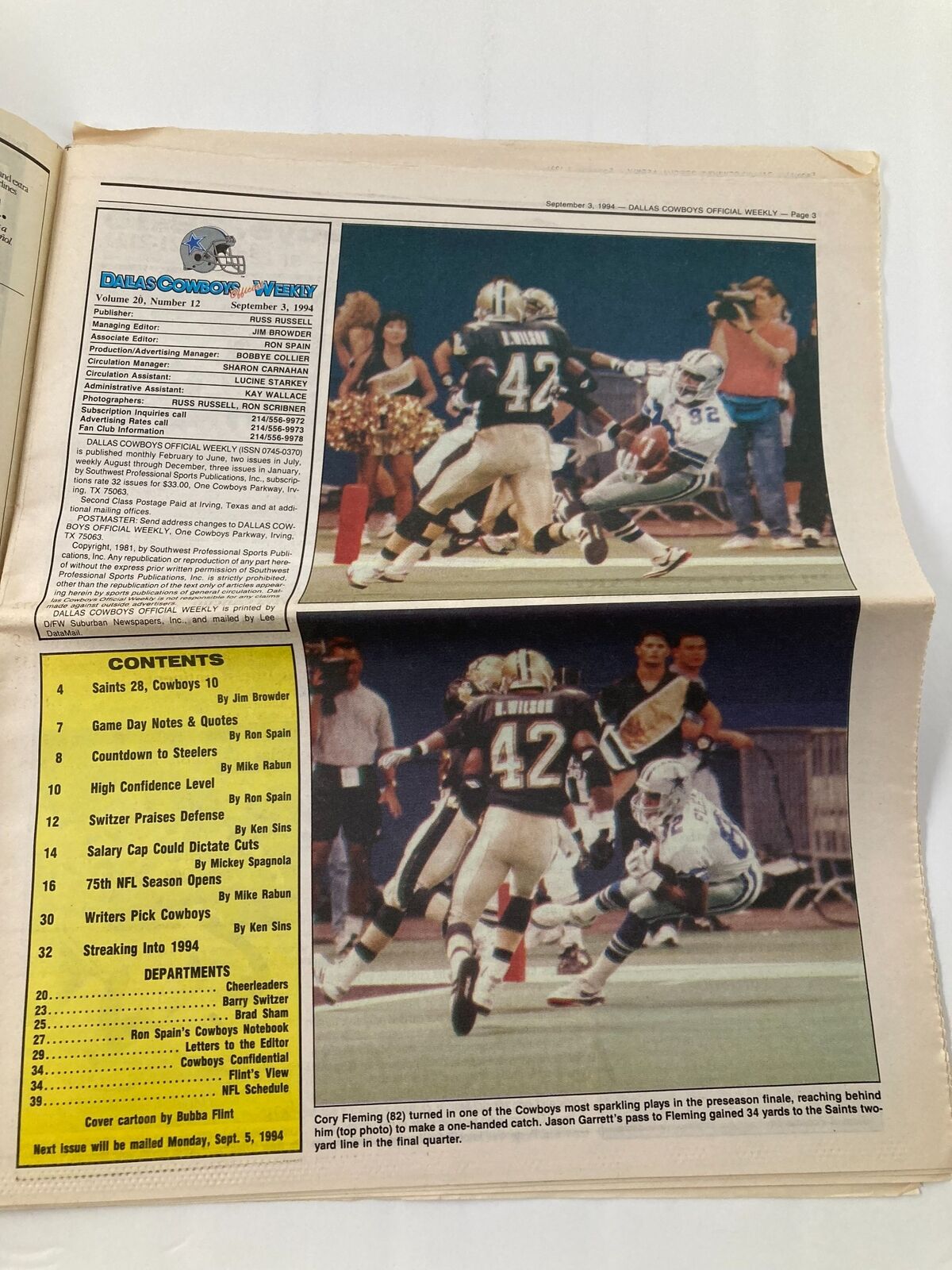 Inside page of Dallas Cowboys Weekly Newspaper September 3 1994 showcasing a game highlight with two players in action, including Cory Fleming wearing jersey number 82.