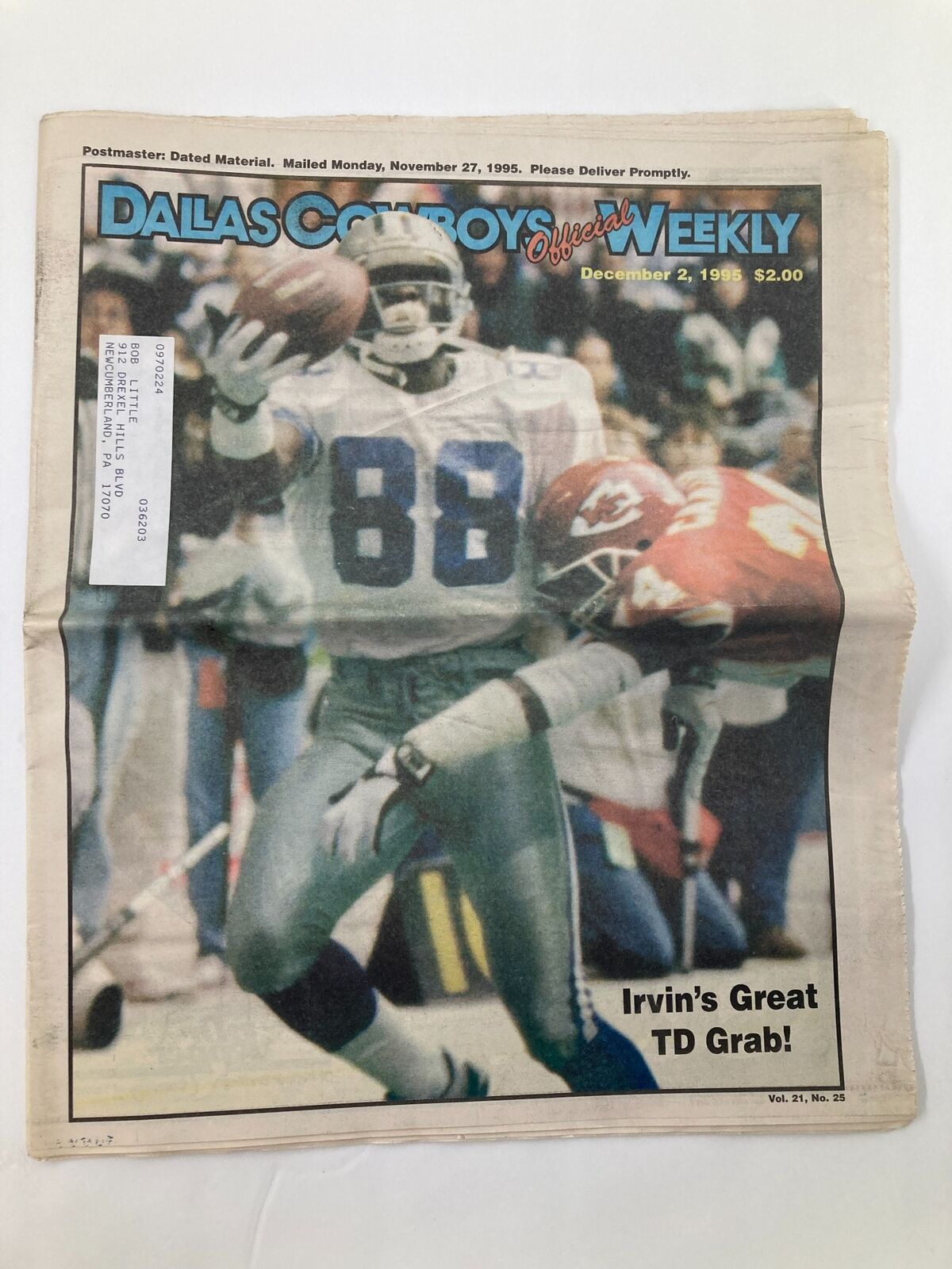 Dallas Cowboys Weekly Newspaper December 2 1995 Vol 21 #25 featuring Michael Irvin catching a touchdown pass against the Kansas City Chiefs.