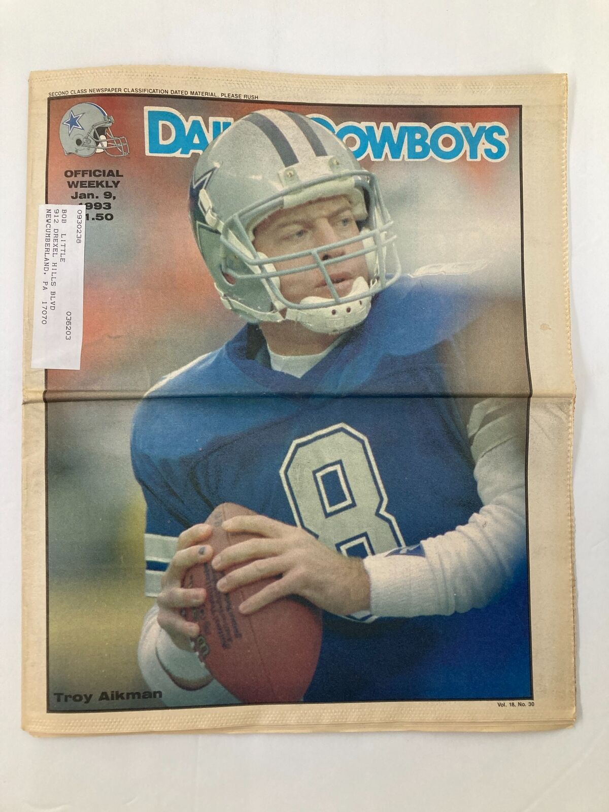 Dallas Cowboys Weekly Newspaper January 9 1993 Vol 18 #30 featuring Troy Aikman on the cover, showcasing him in a blue jersey preparing to pass.