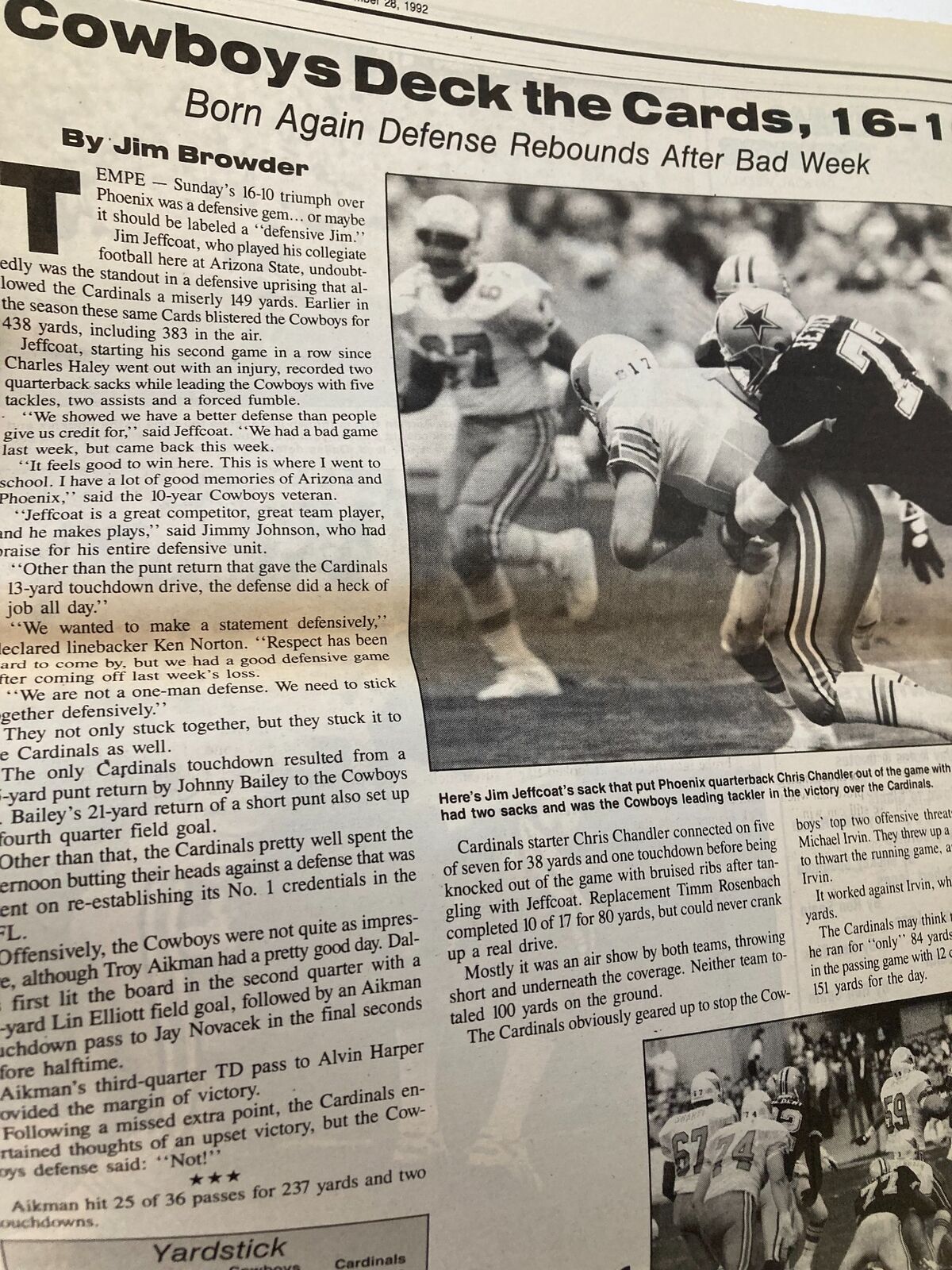 Image from Dallas Cowboys Weekly Newspaper November 28 1992 Vol 18 #24 illustrating the Cowboys defense in action against the Arizona Cardinals during a football game.