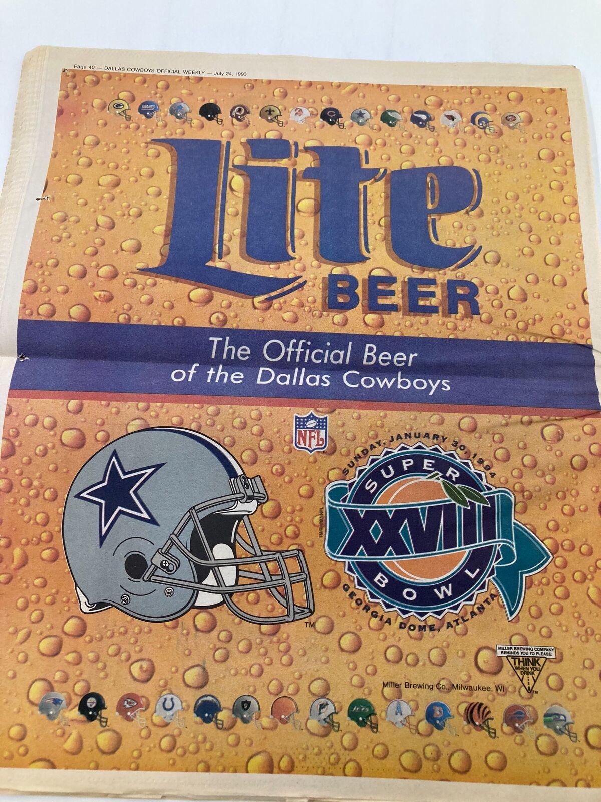 Dallas Cowboys Weekly Newspaper July 24 1993 Vol 19 #6 featuring an advertisement for Lite Beer, the official beer of the Dallas Cowboys, complemented by team logos and images related to Super Bowl XXVIII, reflecting team sponsorship.