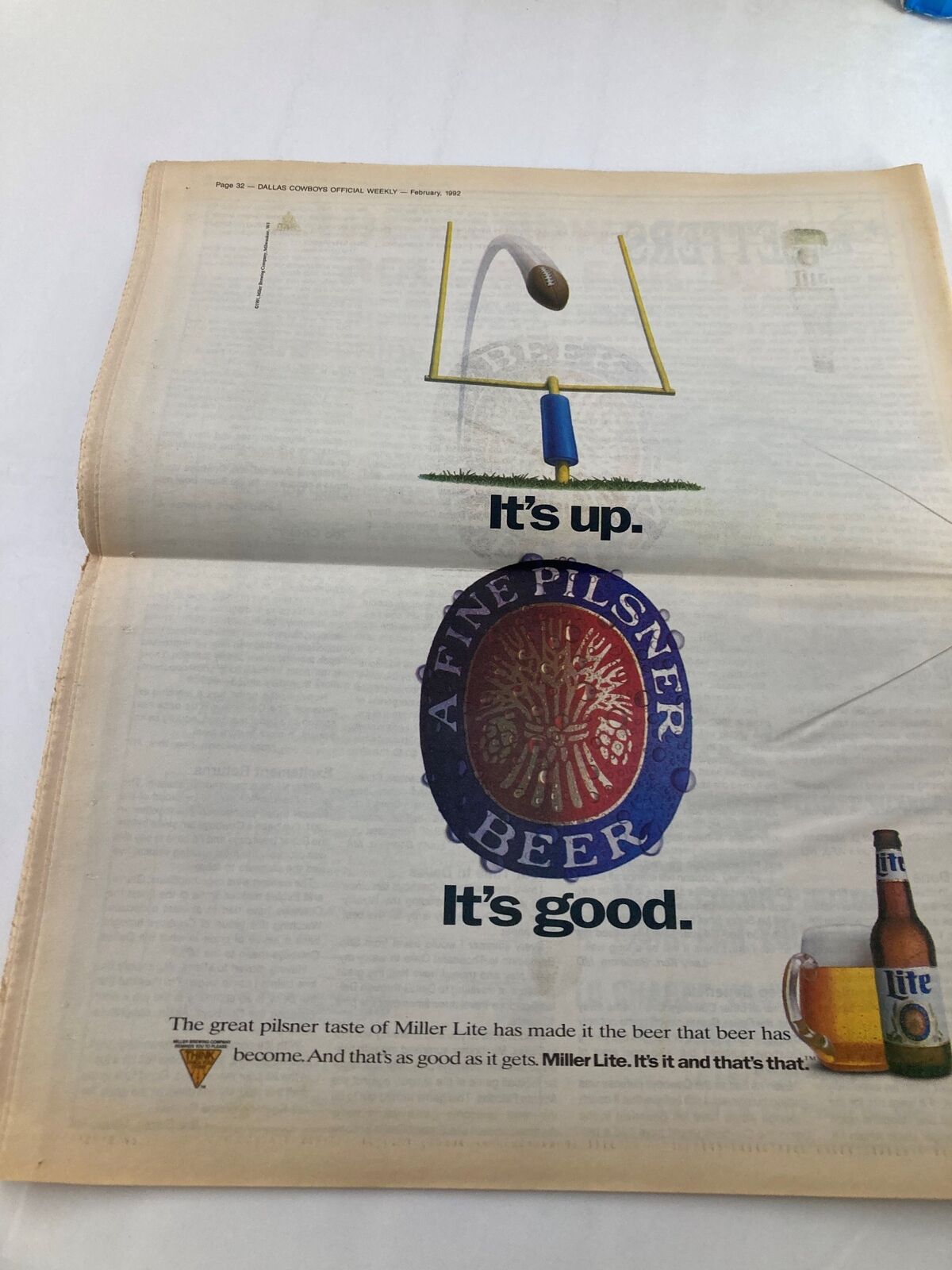 Advertisement featured in the Dallas Cowboys Weekly Newspaper February 1992, promoting Miller Lite beer with visual elements related to football.