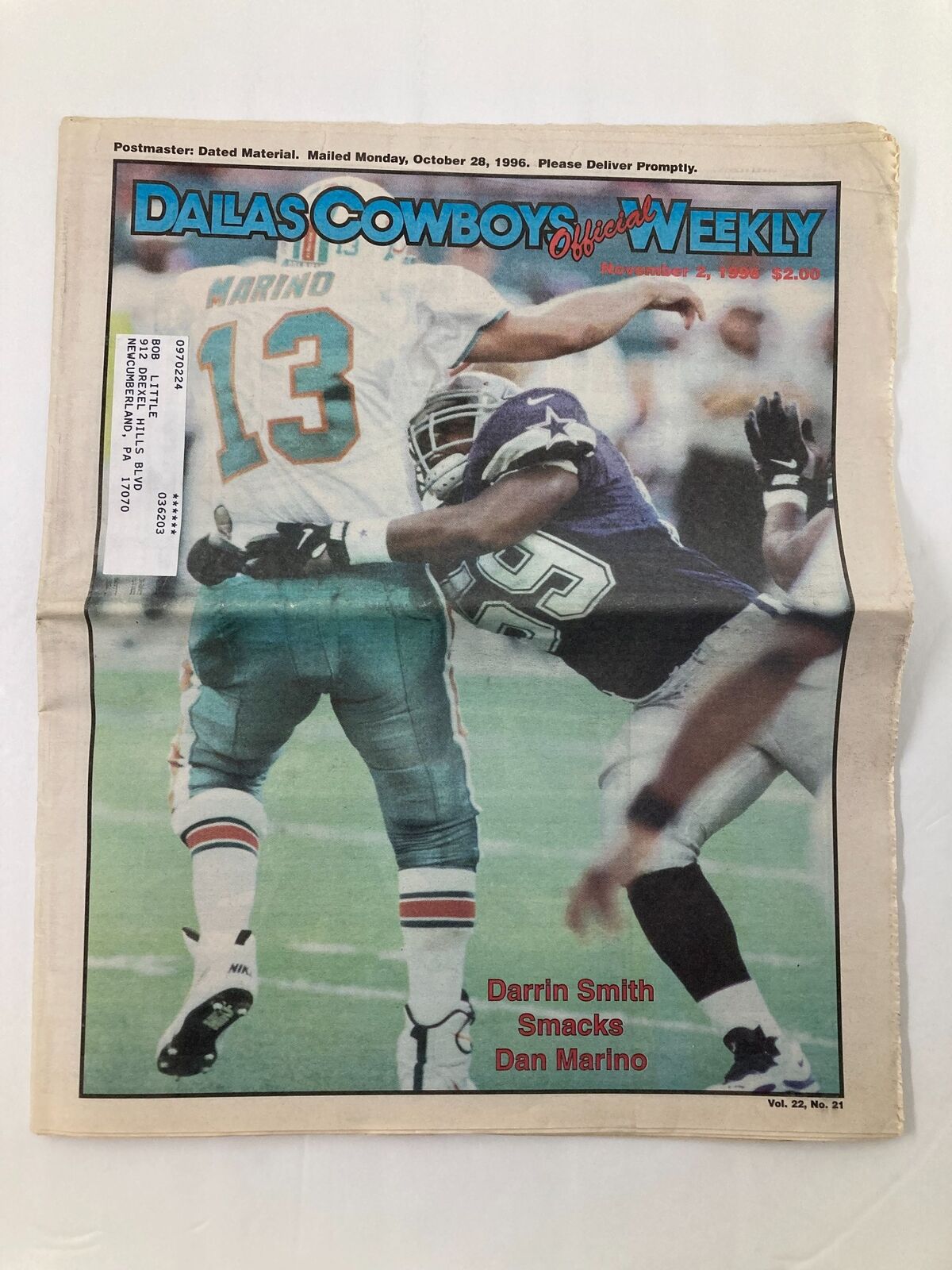 Dallas Cowboys Weekly Newspaper November 2 1996 Vol 22 #21 featuring Darrin Smith tackling Dan Marino, showcasing an iconic NFL moment.