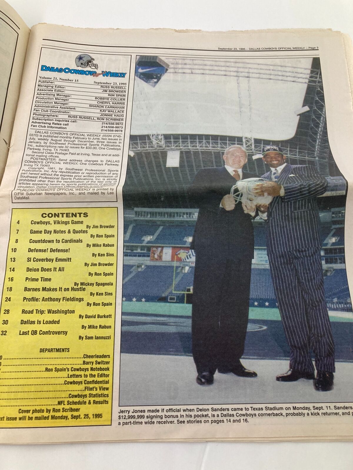 Inside page of Dallas Cowboys Weekly Newspaper September 23 1995, displaying a photo of Jerry Jones and Deion Sanders at Texas Stadium. This page provides insights about the team's dynamics and recent events.