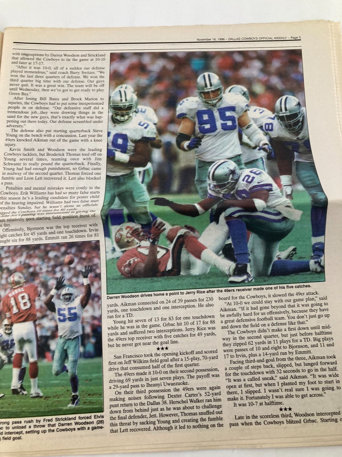 Dallas Cowboys Weekly Newspaper November 16 1996 Vol 22 #23 featuring a photo of Cowboys players, including Darren Woodson and Troy Aikman, discussing a critical play from the game against the 49ers.