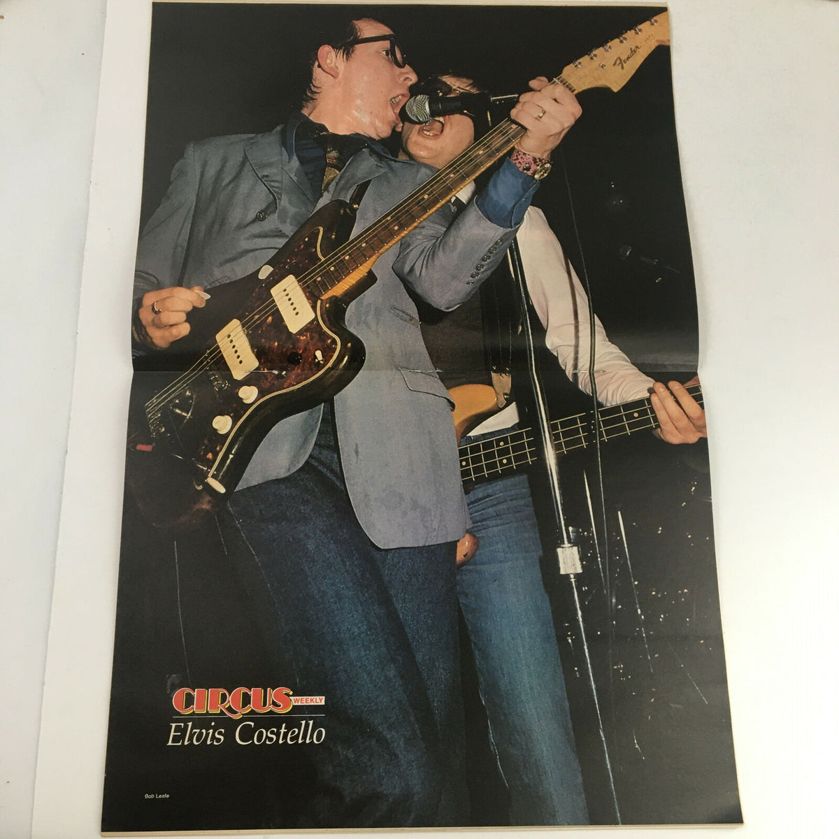 Poster featuring Elvis Costello from Circus Magazine March 13, 1979. This vintage item adds a collectible element to the magazine's appeal for music enthusiasts.