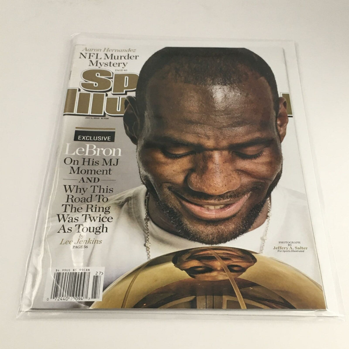 Front cover of Sports Illustrated Magazine July 1, 2013, featuring LeBron on his MJ Moment with a focus on the trophy he is holding, showcasing the magazine's mint condition.