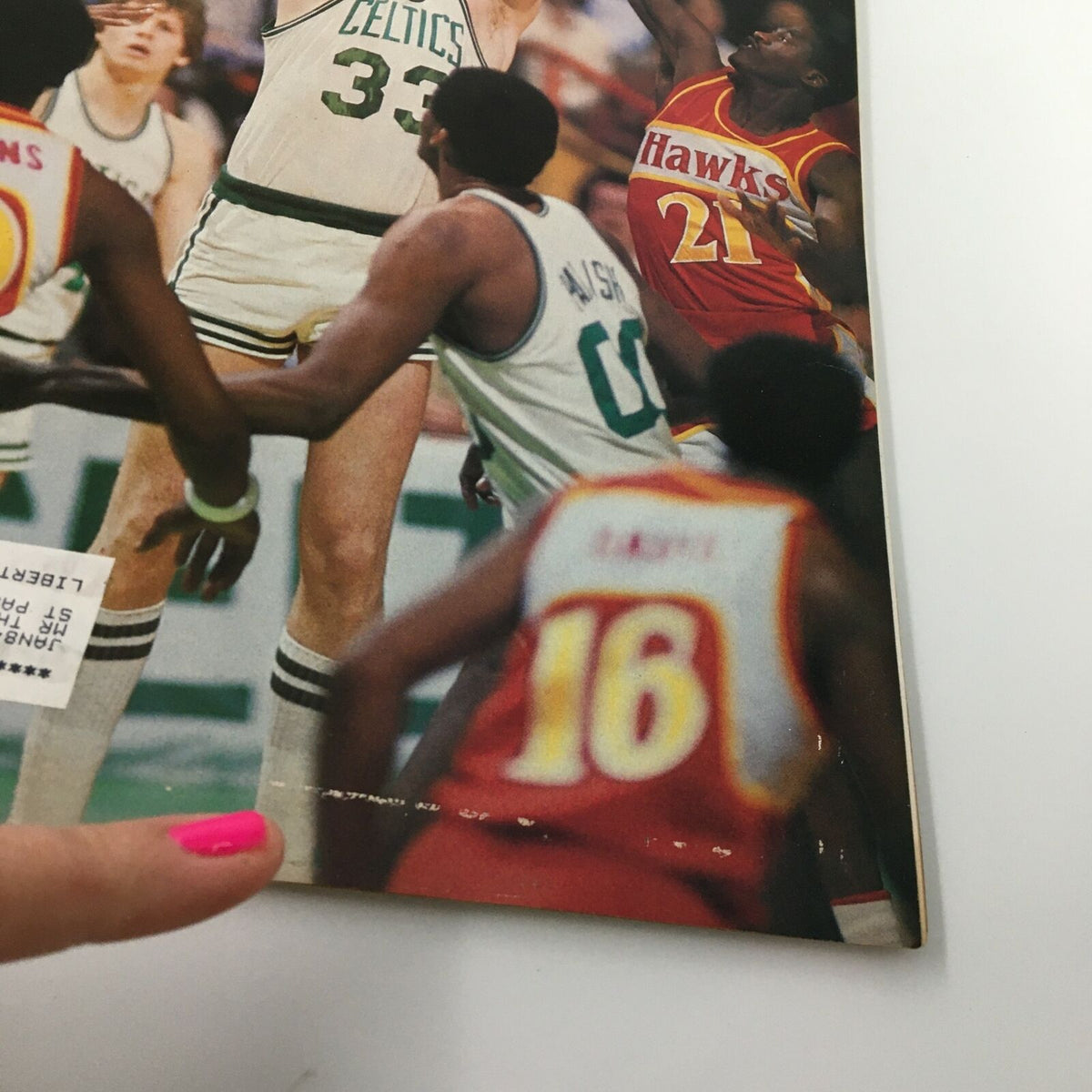VTG Sports Illustrated Magazine May 2 1983 featuring basketball players in action, highlighting Larry Bird of the Boston Celtics and showcasing the intense competition during an NBA game.