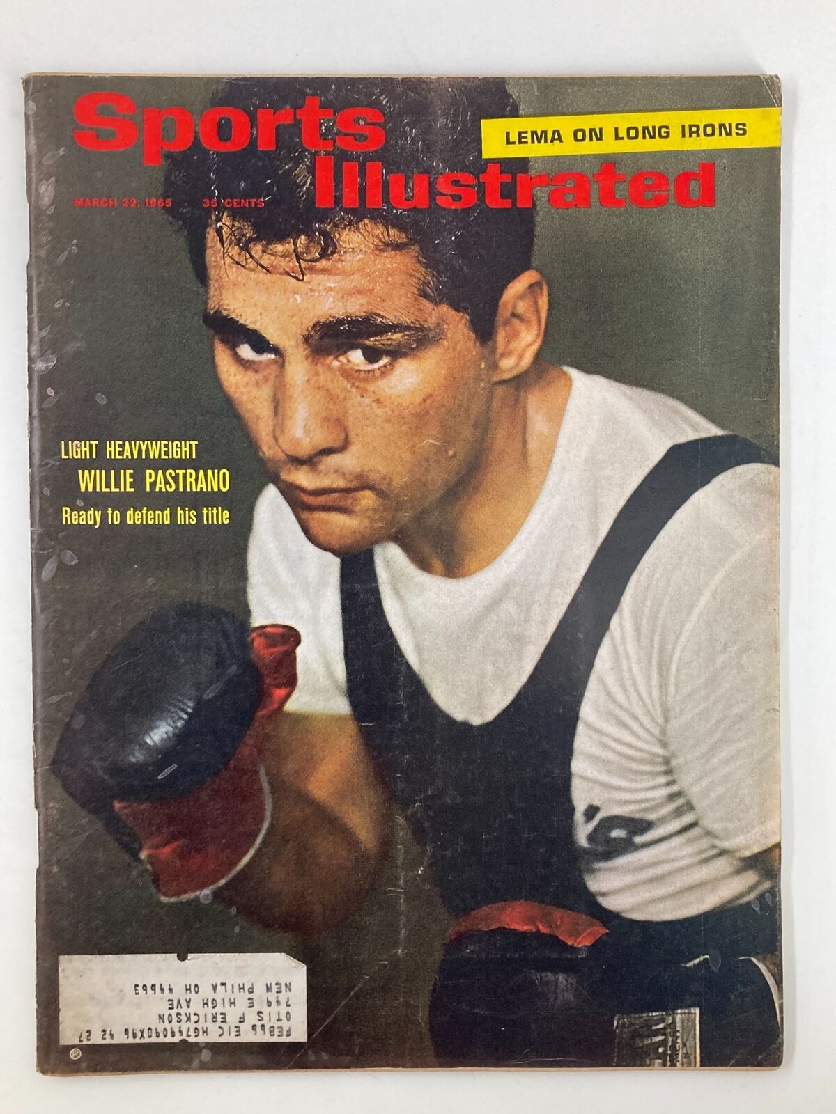 Vintage Sports Illustrated Magazine from March 22, 1965 featuring light heavyweight champion Willie Pastrano on the cover, showcasing his intense expression and boxing gloves.