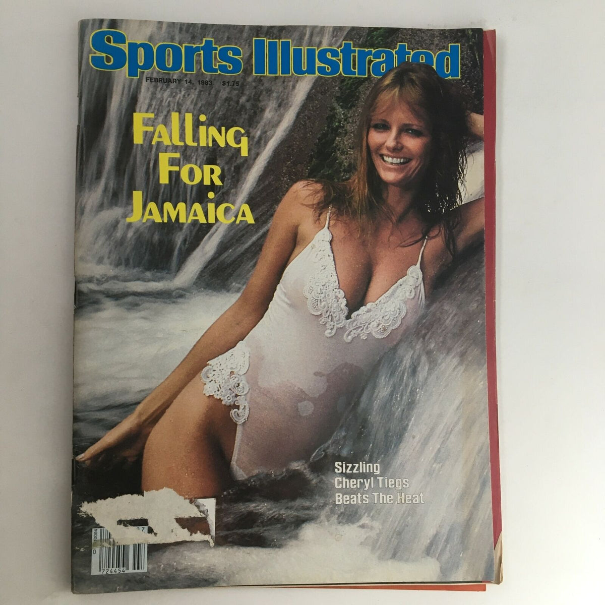 Cover of Sports Illustrated Magazine February 14 1983 featuring Cheryl Tiegs, with the headline 'Sizzling Cheryl Tiegs Beats Heat' against a backdrop of a waterfall.