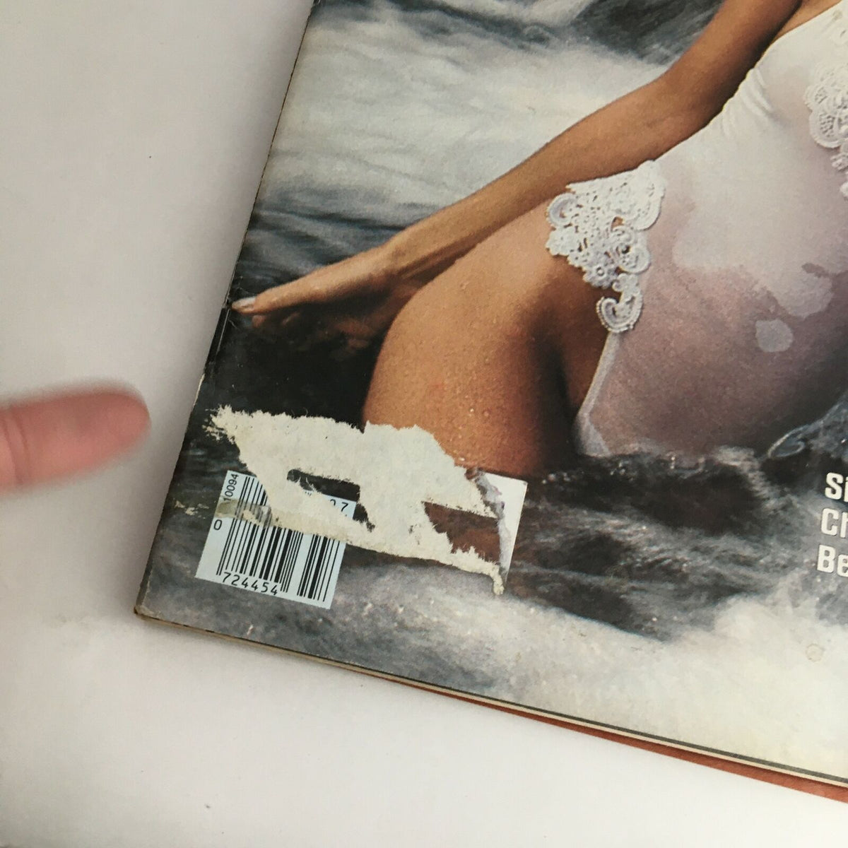 Close-up of the cover of Sports Illustrated Magazine February 14 1983, showing Cheryl Tiegs in a swimsuit with the title 'Sizzling Cheryl Tiegs Beats Heat' partially hidden.
