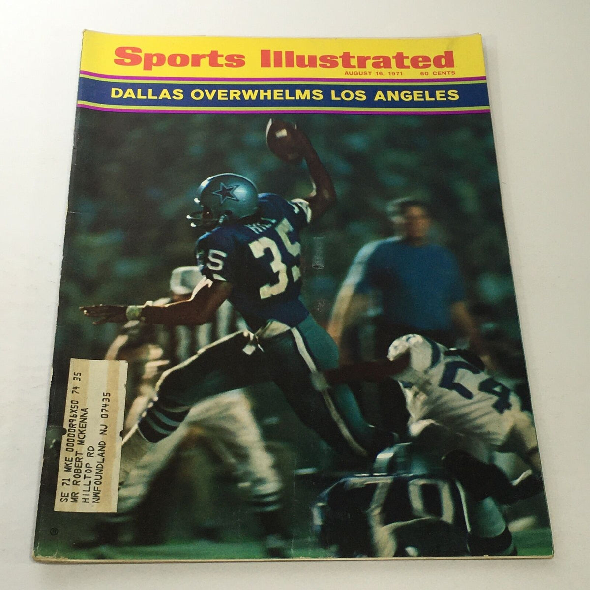 Cover of Sports Illustrated dated August 16, 1971, featuring the headline 'Dallas Overwhelms Los Angeles' with an image of a player in action.