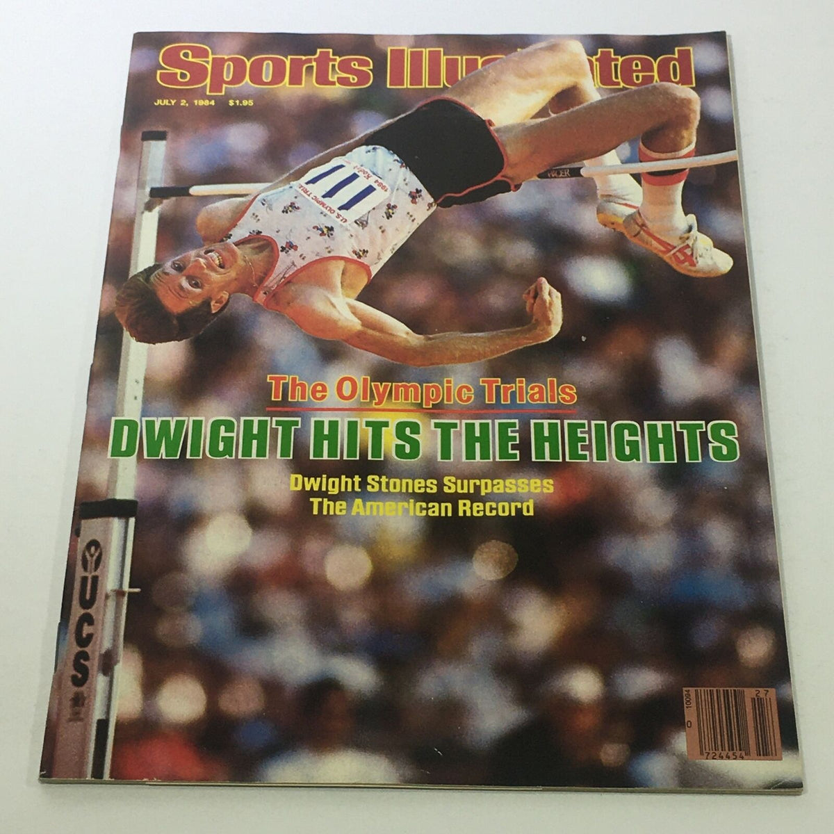 Sports Illustrated cover from July 2, 1984, featuring Dwight Stones, showcasing his achievement of surpassing the American record in the Olympic Trials with the headline 'Dwight Hits The Heights'.