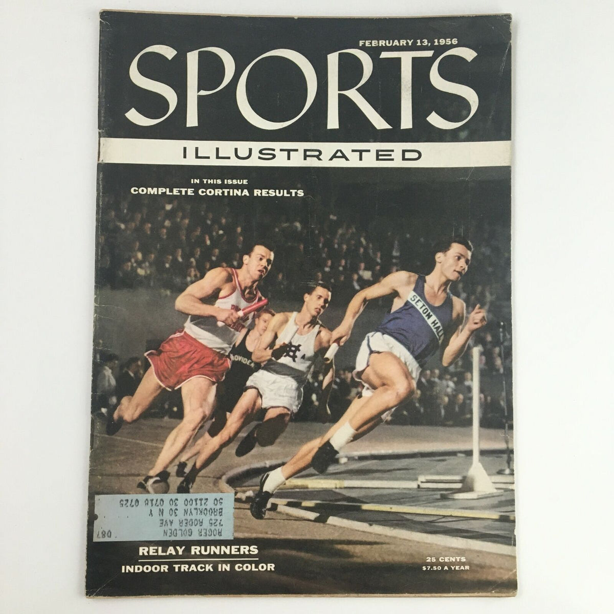 Sports Illustrated Magazine February 13 1956 cover featuring relay runners competing in an indoor track event. The vibrant color captures the excitement of athletic competition, showcasing the speed and agility of the runners.