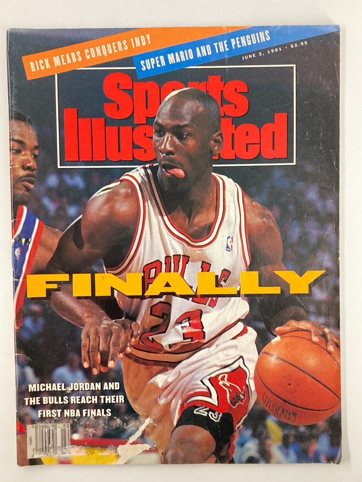 Cover of Sports Illustrated Magazine dated June 3, 1991, featuring Michael Jordan during his first NBA Finals appearance with the Chicago Bulls, highlighting the triumphant moment in sports history.