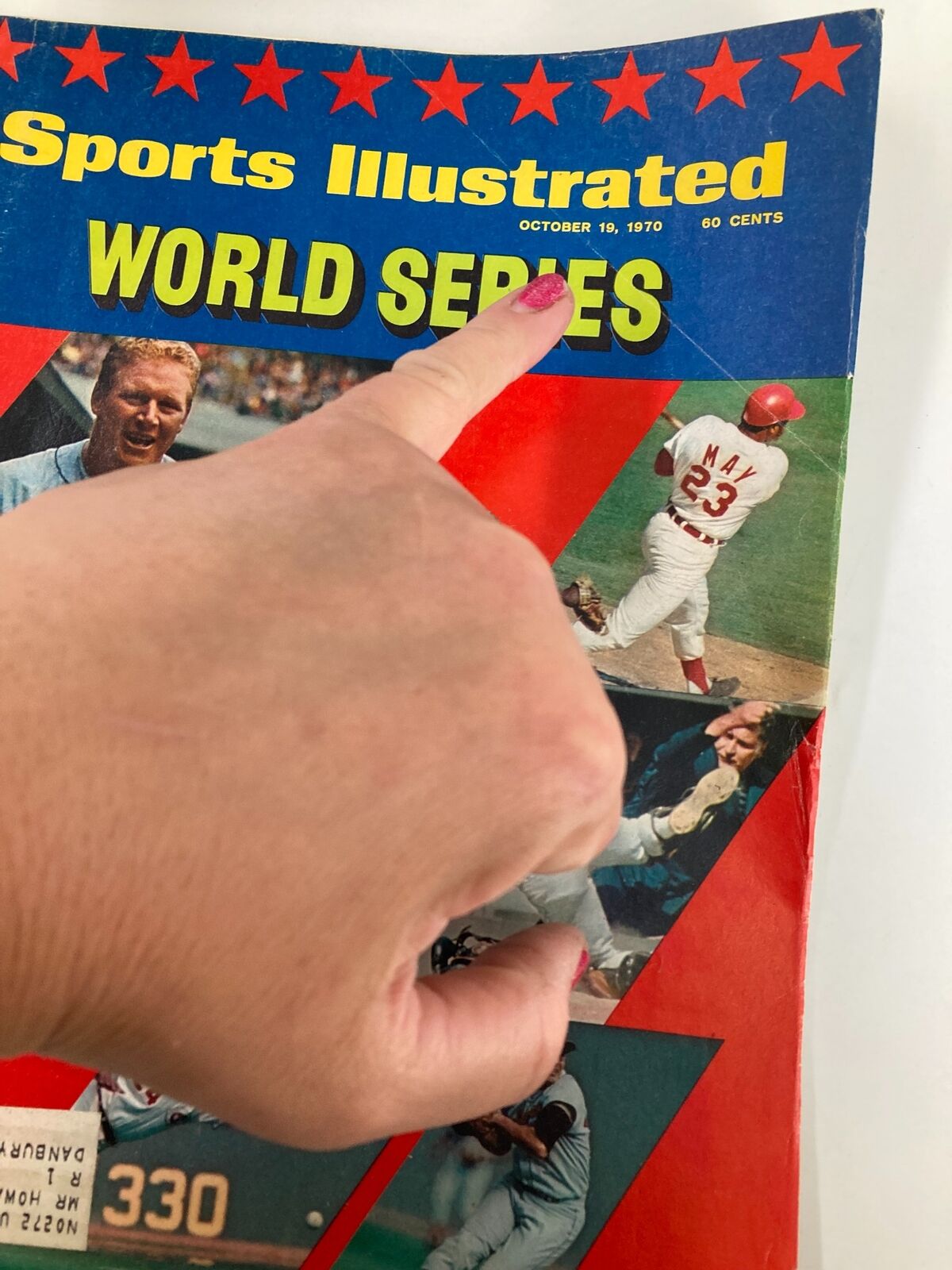 Close-up of the October 19, 1970 Sports Illustrated magazine cover, emphasizing the title 'WORLD SERIES' along with images of iconic players like Brooks Robinson and Willie Mays.