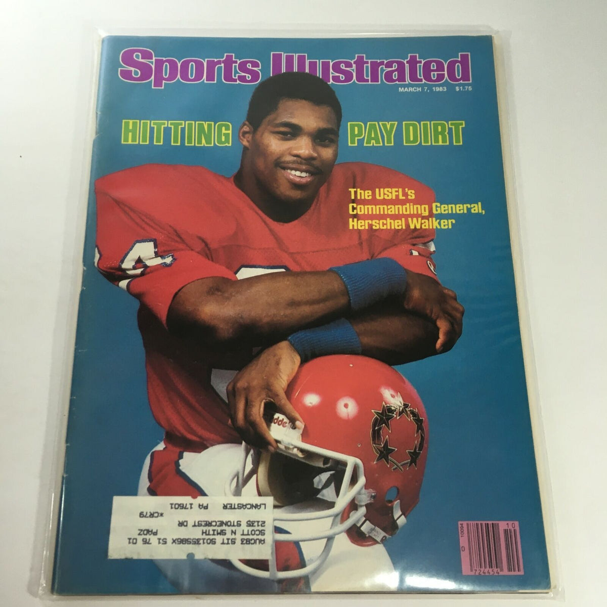 Cover of Sports Illustrated from March 7, 1983 featuring USFL's Commanding General Herschel Walker in a red football uniform, highlighting sports achievements and the theme 'Hitting Pay Dirt'.