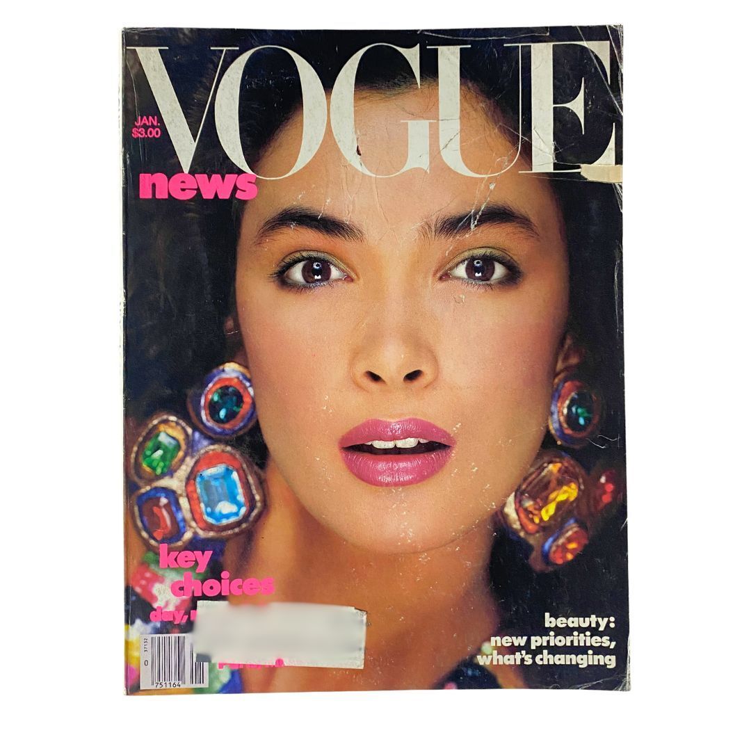 Cover of VTG Vogue Magazine January 1986 featuring model Linda Spierings photographed by Richard Avedon, showcasing bold fashion and vibrant beauty.