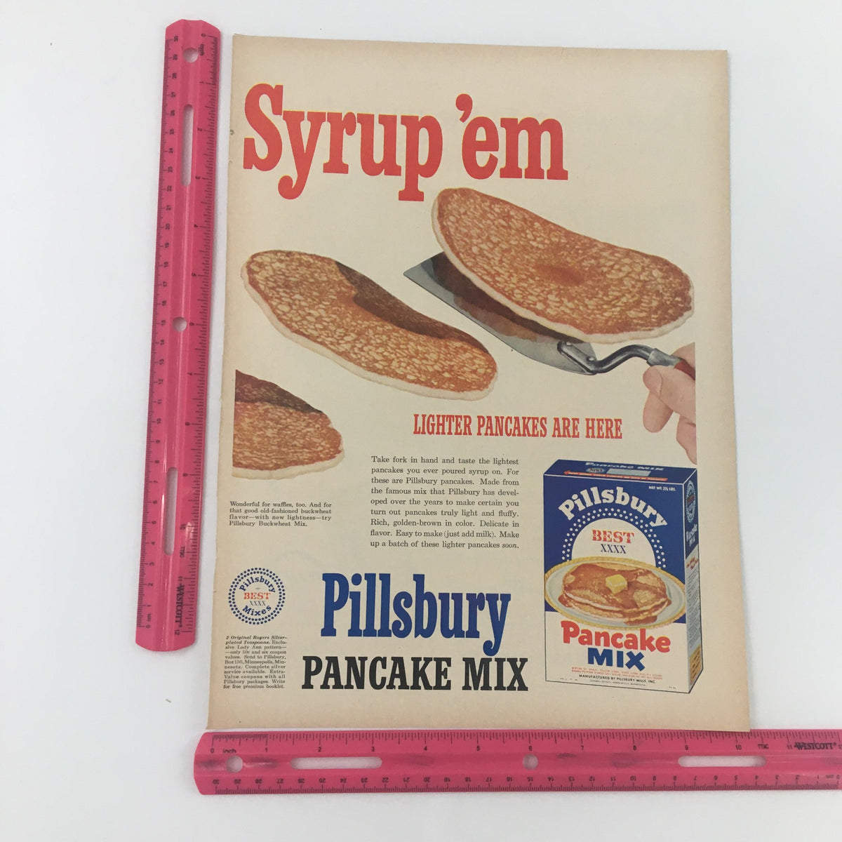 1950 Pillsbury Best Light Pancake Mix Vintage Print Ad featuring a hand flipping pancakes, emphasizing lighter pancakes with the tagline 'Syrup 'em,' showcasing the colorful and nostalgic design of mid-century advertising.