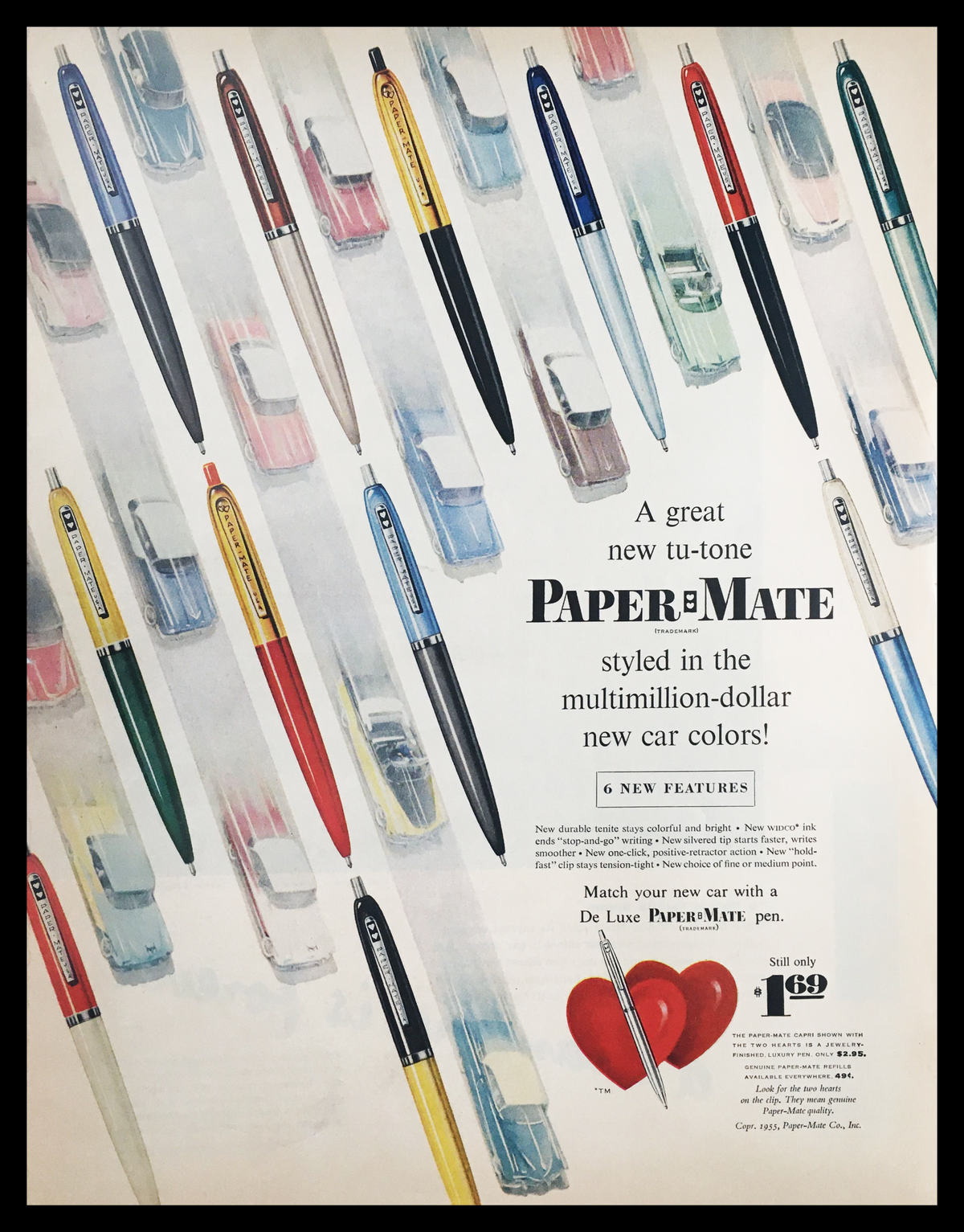 1955 De Luxe Paper Mate Pen Vintage Print Ad featuring various colorful pens against a backdrop of classic cars, showcasing the innovative design and style of mid-century writing instruments.