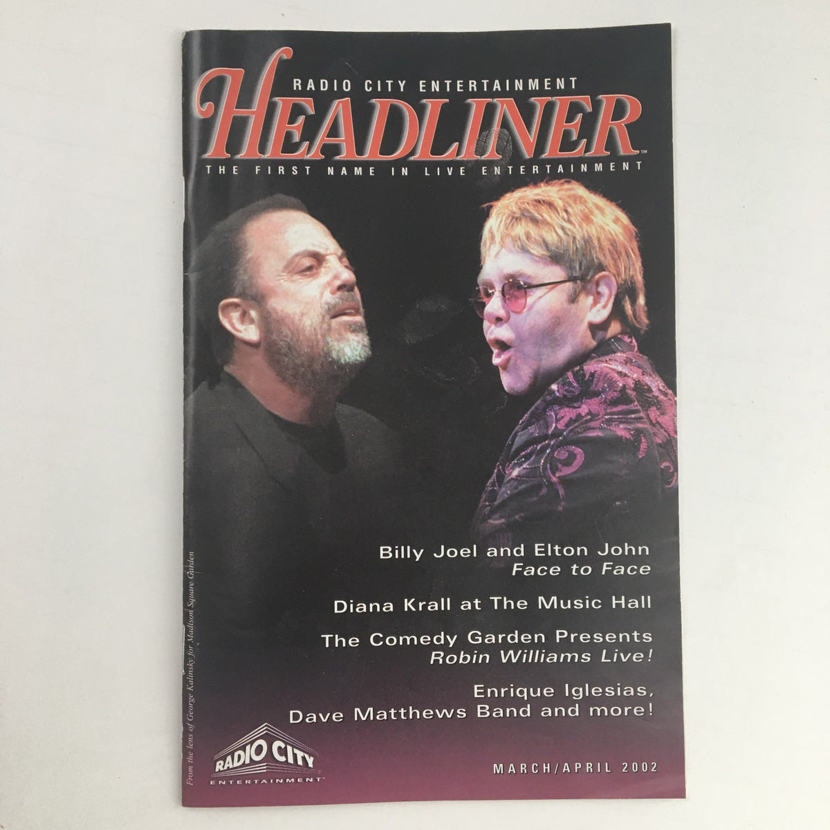 2002 Radio City Entertainment Headliner featuring Billy Joel and Elton John Face to Face on the cover, showcasing both artists in a dynamic pose. March/April edition.