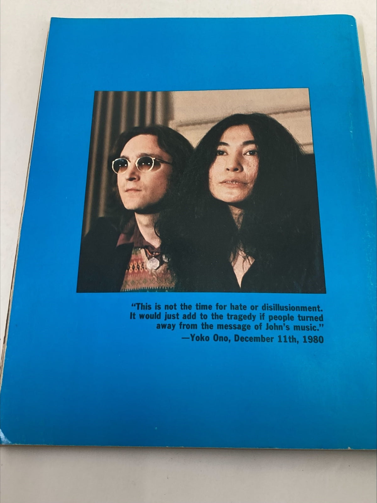 Image of the cover of the 1981 The Beatles' John Lennon Yoko Ono A Memorial Album, featuring John Lennon and Yoko Ono, with a quote from Yoko Ono about the message of John’s music.