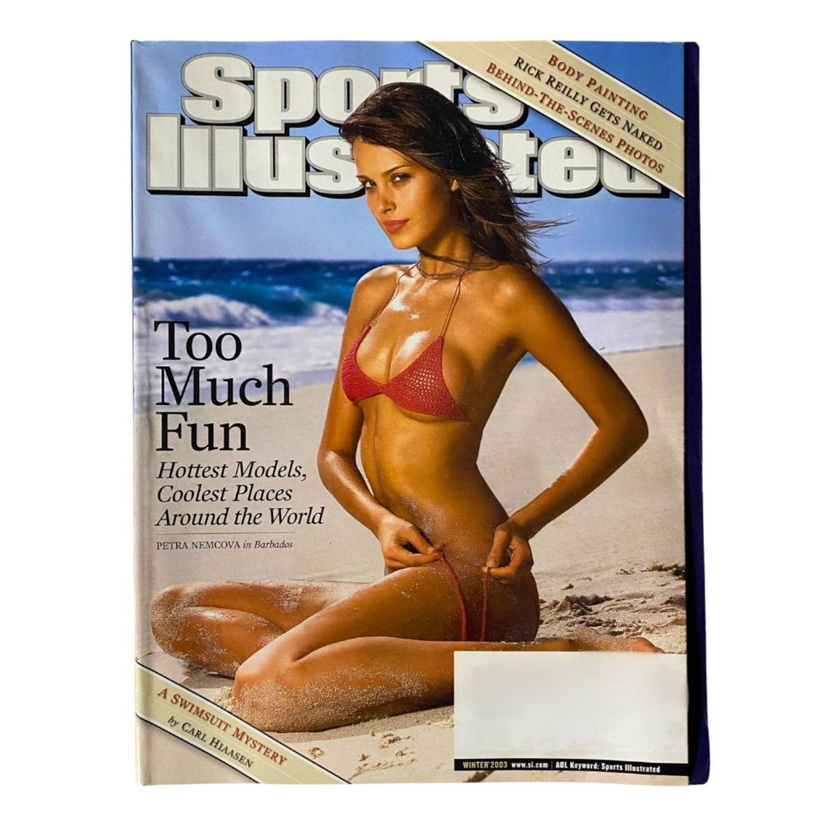 Cover of Sports Illustrated Swimsuit Edition Winter 2003 featuring model Petra Nemcova in a bikini on the beach, emphasizing tropical fun in Barbados.