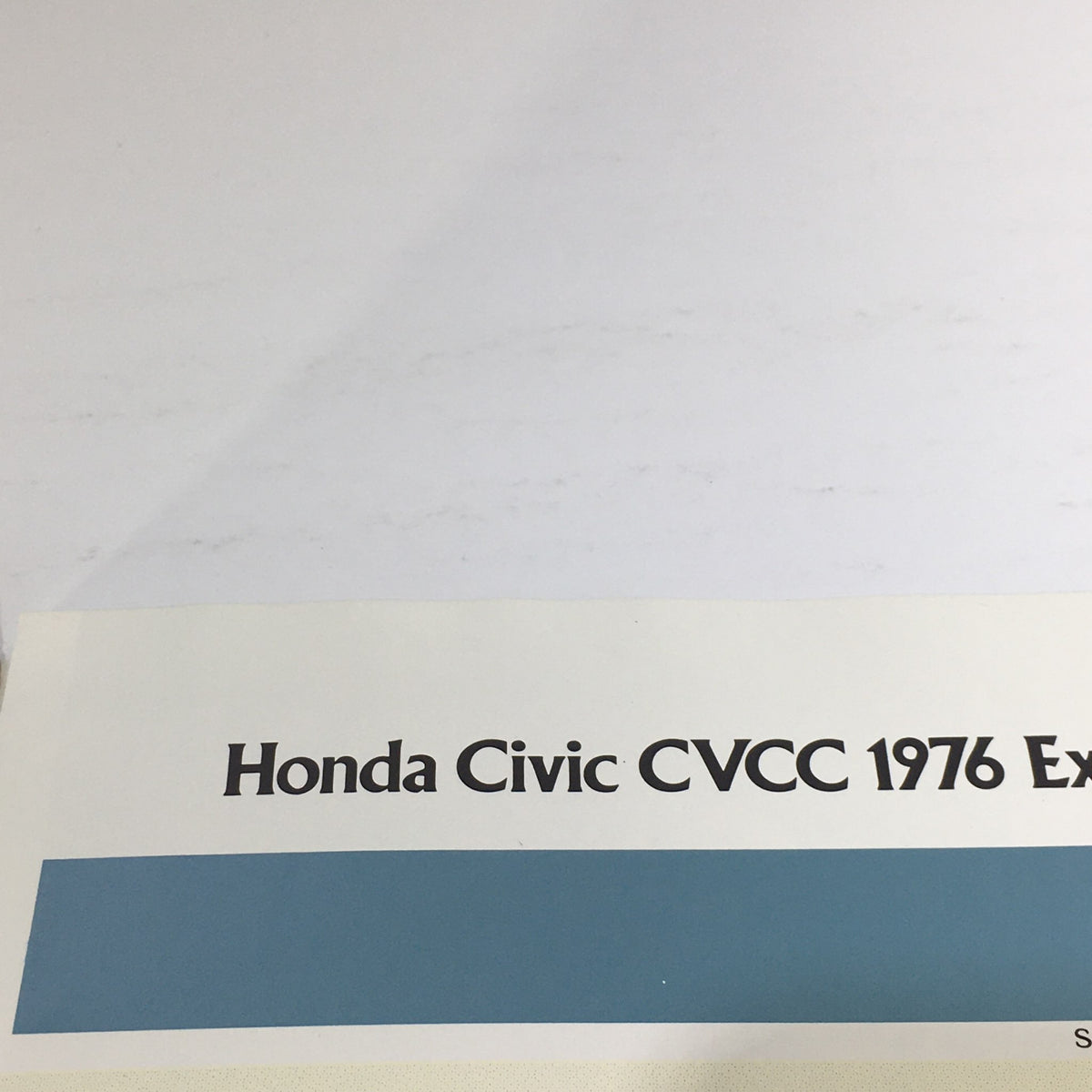 Close-up of the title 'Honda Civic CVCC 1976' on the interior of the brochure from the 1976 Honda CVCC 5-Speed Wagon Dealership Car Auto Brochure Catalog.