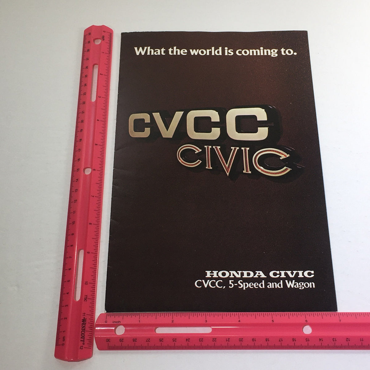 Measurement of the front cover of the 1976 Honda CVCC 5-Speed Wagon Dealership Car Auto Brochure Catalog, highlighting its dimensions and design.