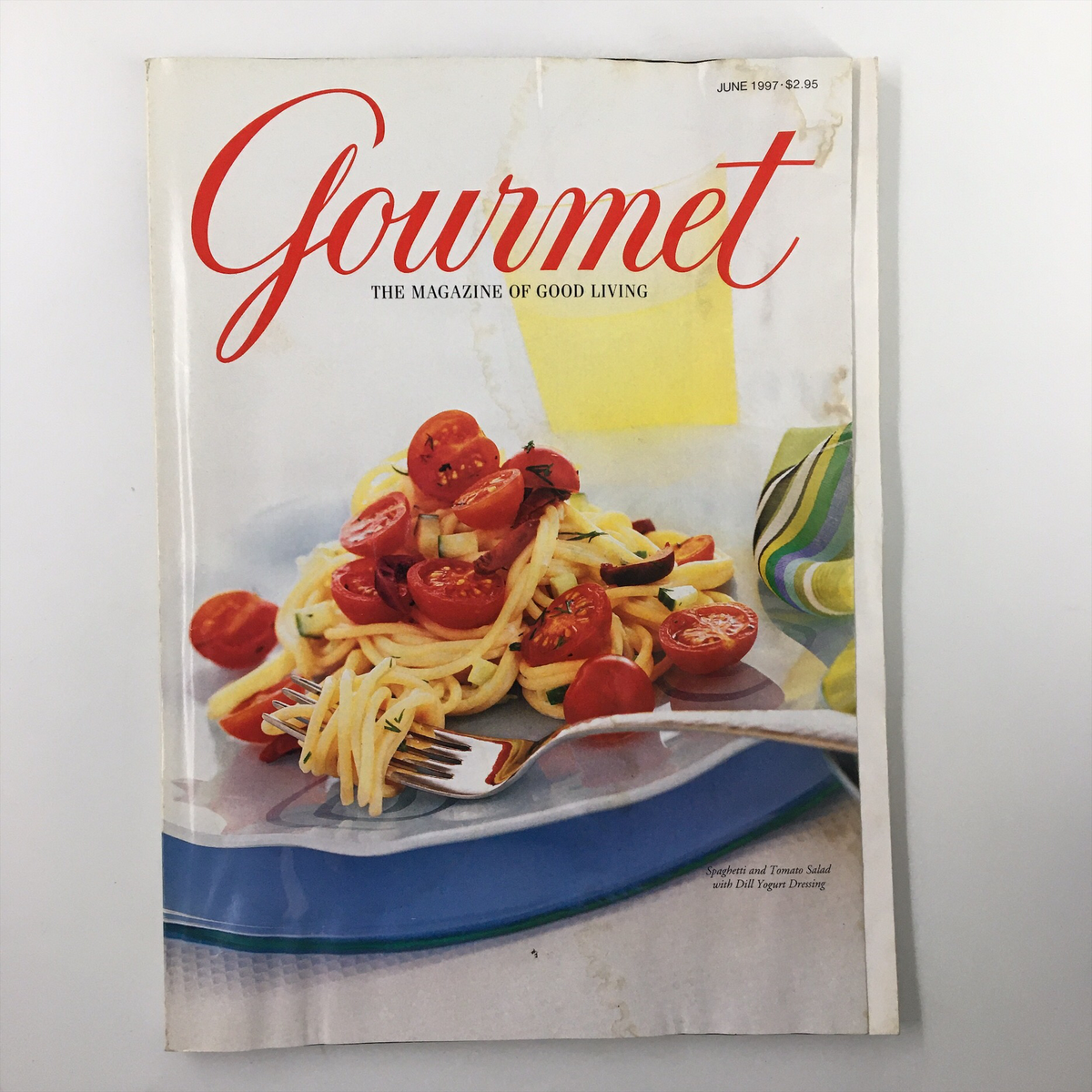 Cover of Gourmet Magazine June 1997 featuring Spaghetti and Tomato Salad with Yogurt, highlighting gourmet cooking and culinary trends of the late 90s.