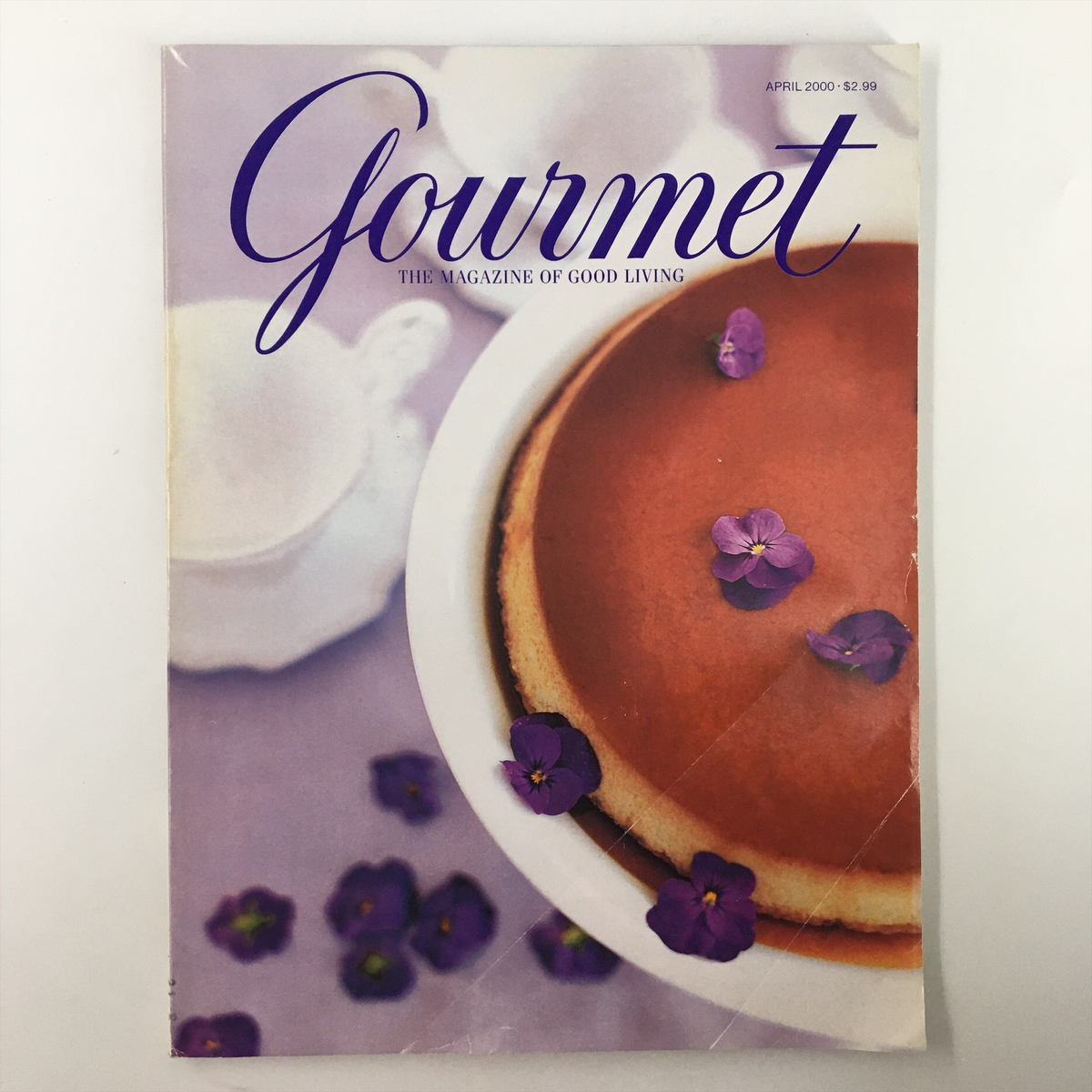 Cover page of Gourmet Magazine April 2000 featuring a dessert with violets, titled 'Gourmet: The Magazine of Good Living'.