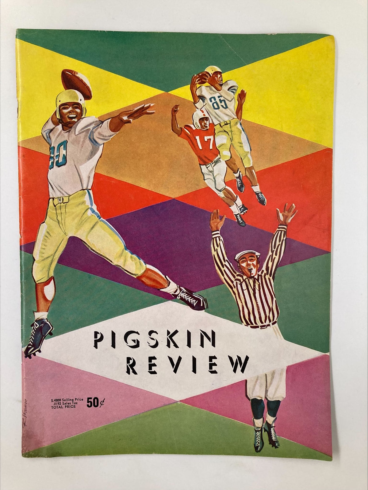 Cover of the November 23 1957 NCAA Football SC Trojans vs UCLA Bruins Pigskin Review featuring colorful design with football players and a referee.