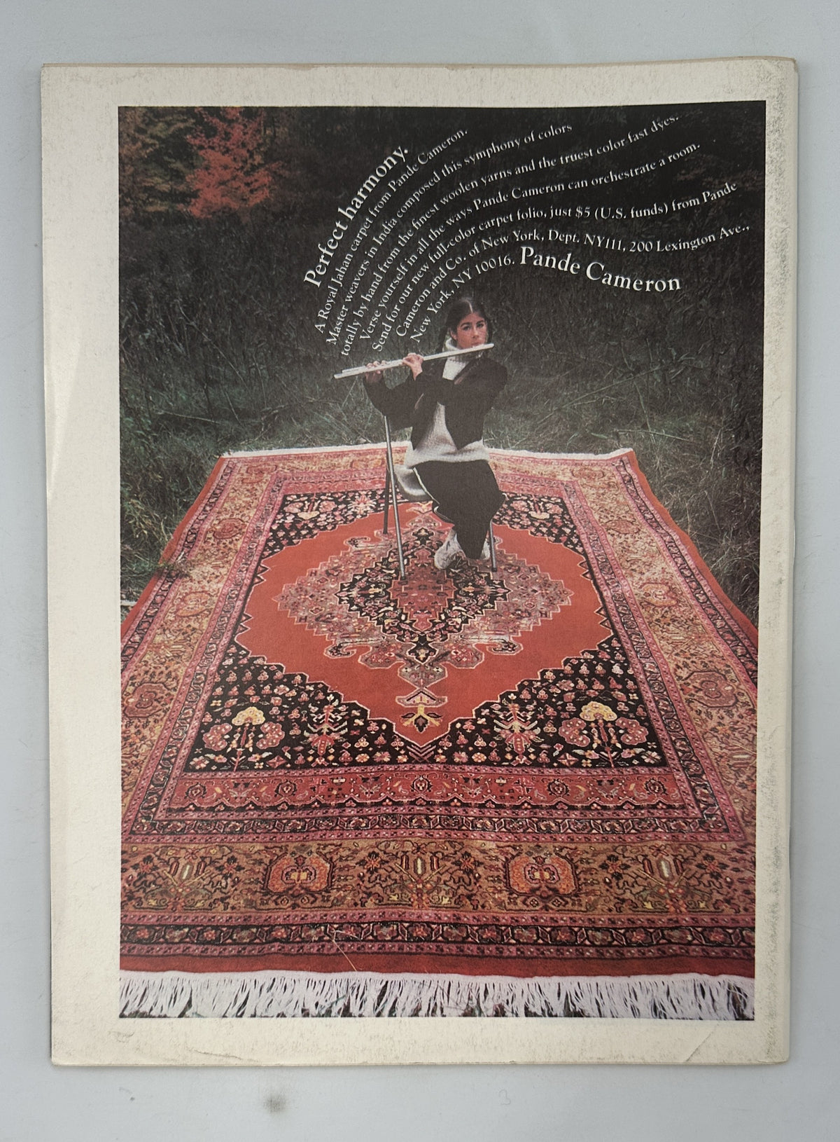 The New Yorker Magazine March 21, 1983 Office Window Exercise Roxie Munro Cover VG, interior illustrated advertisement showing a woman playing the flute while seated on a patterned Persian rug.