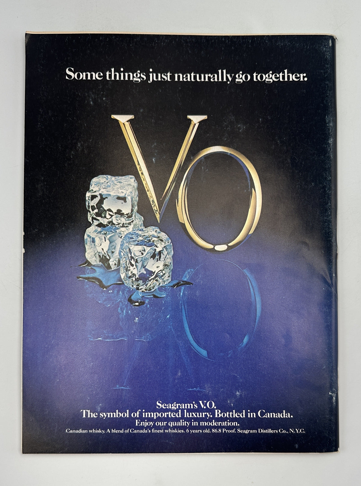 The New Yorker Magazine October 6, 1980 Autumn Tree Painting Eugène Mihaesco Cover, showing a vintage Seagram's V.O. whiskey advertisement with ice cubes and a blue-toned background.