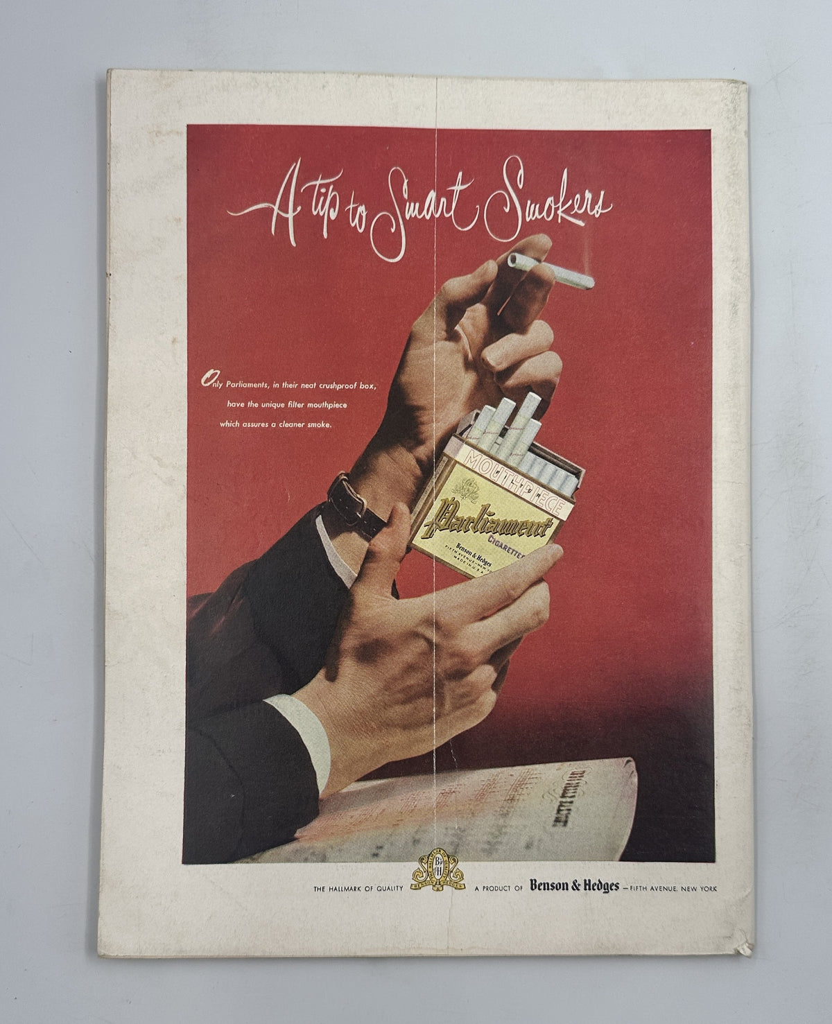 The New Yorker Magazine October 20, 1951 Fall Cleanup Abe Birnbaum Cover interior vintage advertisement featuring hands holding a cigarette and cigarette package against a red background.