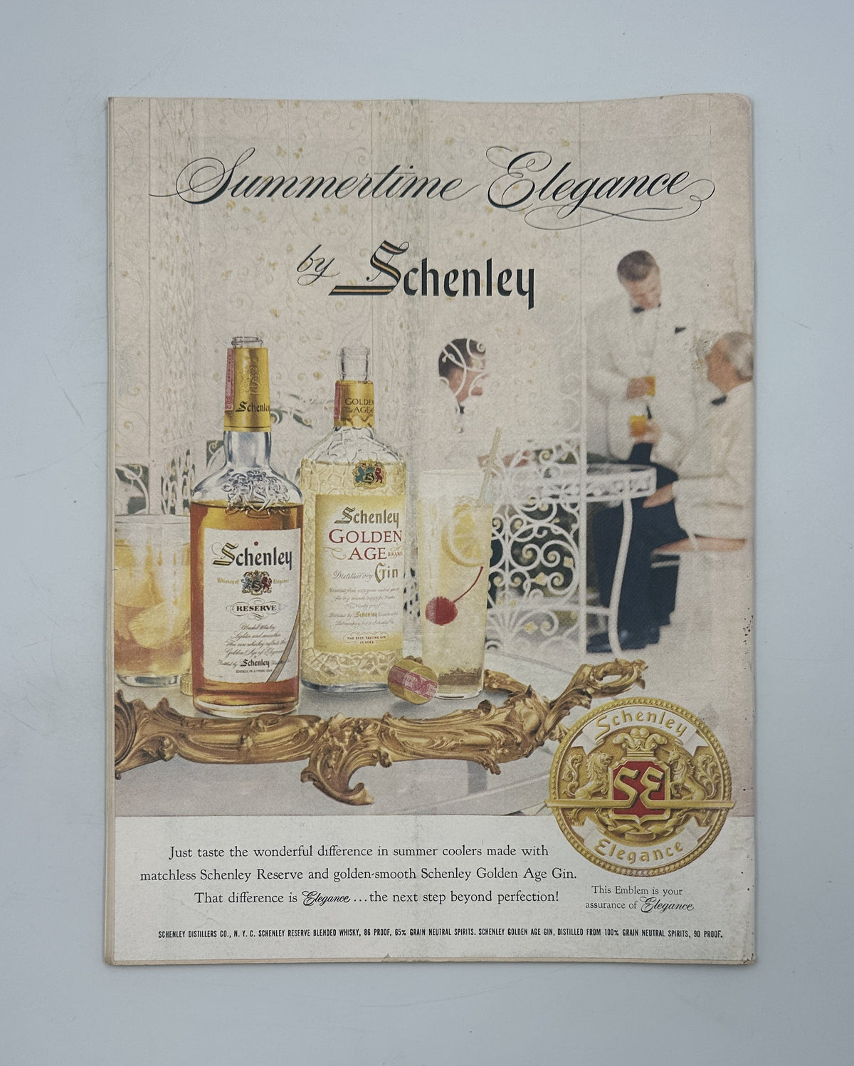 The New Yorker Magazine August 10, 1957 Navy Penguins Peter Arno Cover, featuring a vintage Schenley Summertime Elegance whiskey advertisement with illustrated bottles and cocktail scene.