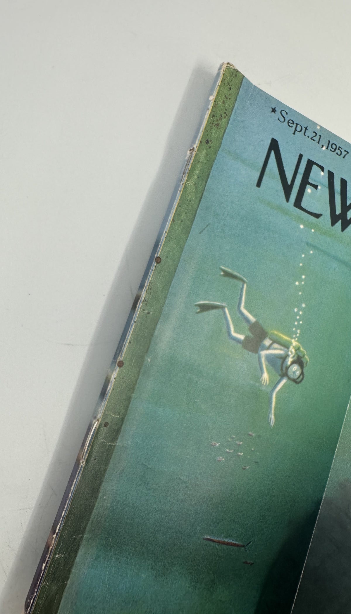 The New Yorker Magazine September 21, 1957 Scuba Diver Shipwreck Charles Addams Cover, close-up view showing the aged spine and scuba diver artwork.