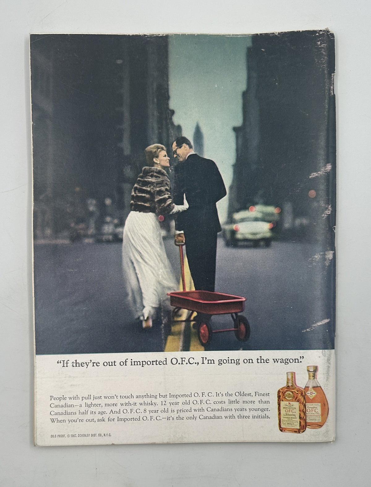The New Yorker Magazine September 28, 1963 Lit House Windows Night André François Cover shown with a vintage illustrated whiskey advertisement depicting a couple beside a red luggage cart on a city street.
