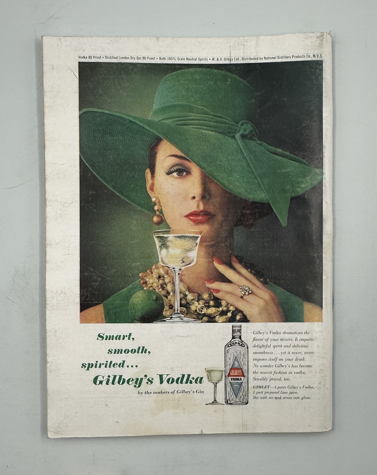 The New Yorker Magazine November 14, 1964 Airport Observation Deck Arthur Getz Cover, vintage Gilbey's Vodka advertisement showing a woman in a green hat holding a cocktail glass.