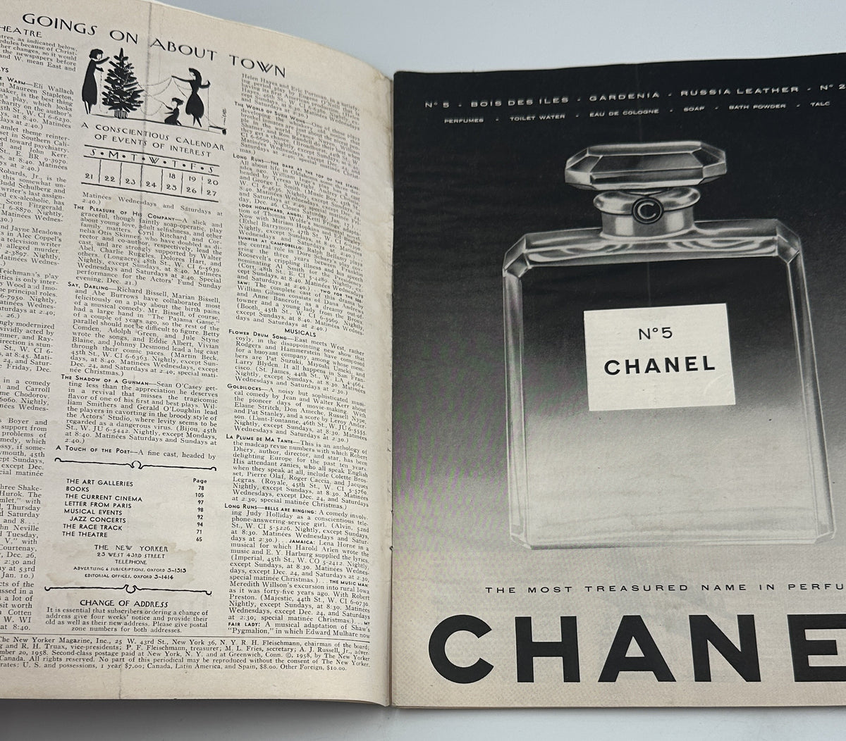 The New Yorker Magazine December 20, 1958 Christmas Taxi Peter Arno Cover opened to a contents page beside a vintage Chanel No. 5 perfume advertisement.