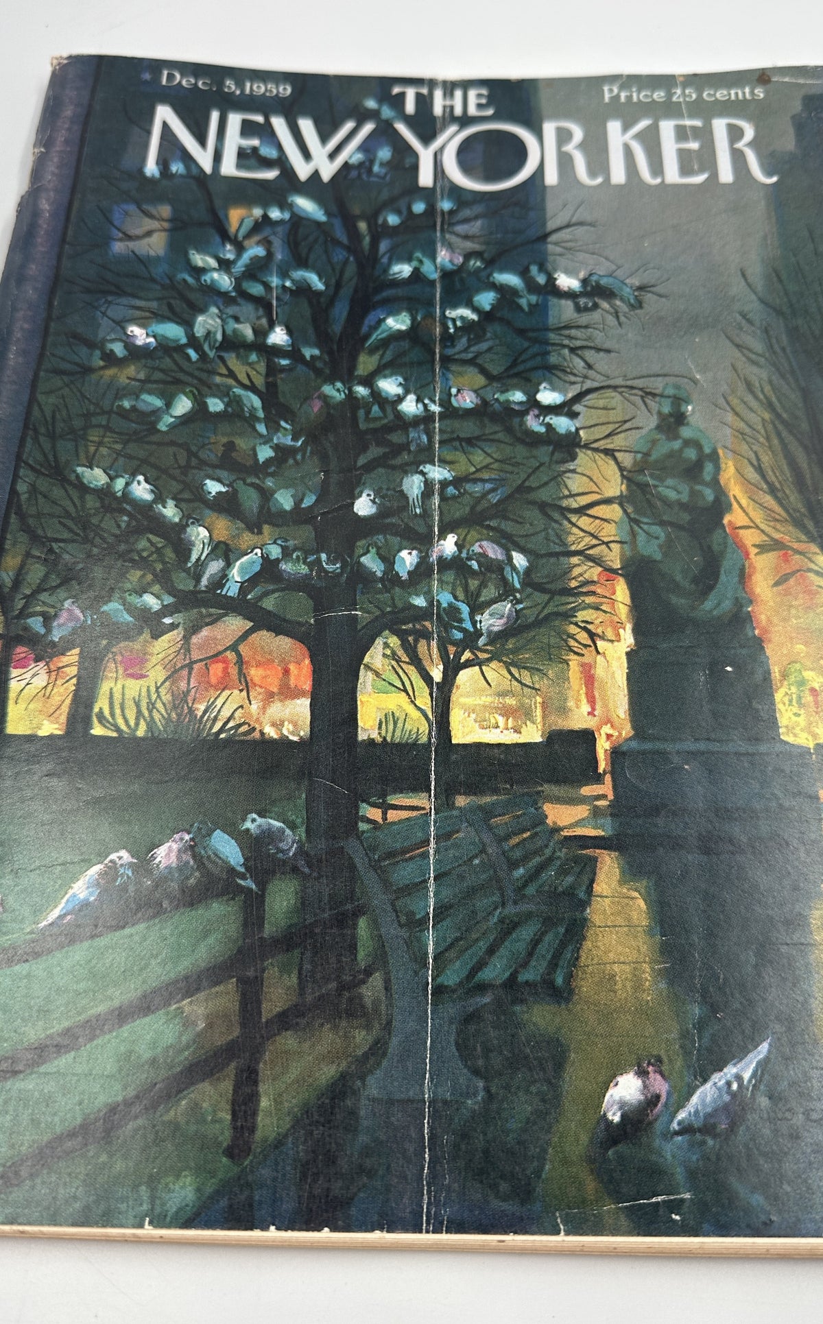 The New Yorker Magazine December 5, 1959 Winter Pigeons Arthur Getz Cover, close-up view of the illustrated winter park scene with pigeons, trees, benches, and glowing city lights.