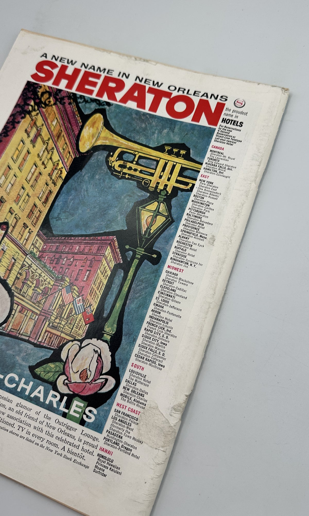 The New Yorker Magazine January 16, 1960 Restaurant City View Arthur Getz Cover showing a vintage Sheraton Hotels advertisement for New Orleans, featuring colorful city architecture, a trumpet, and Sheraton-Charles imagery.